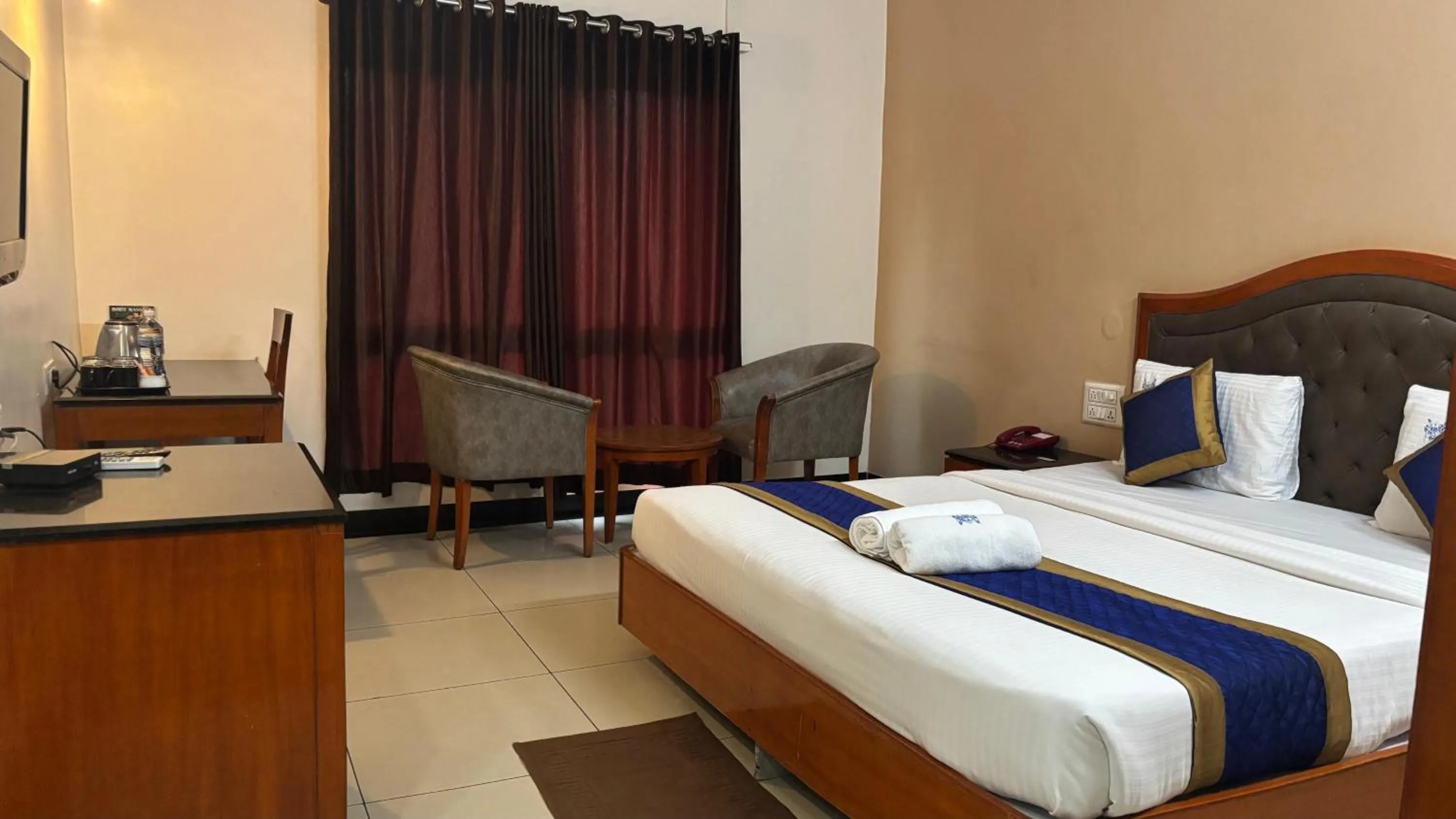 Bed in Hotel Chetan International