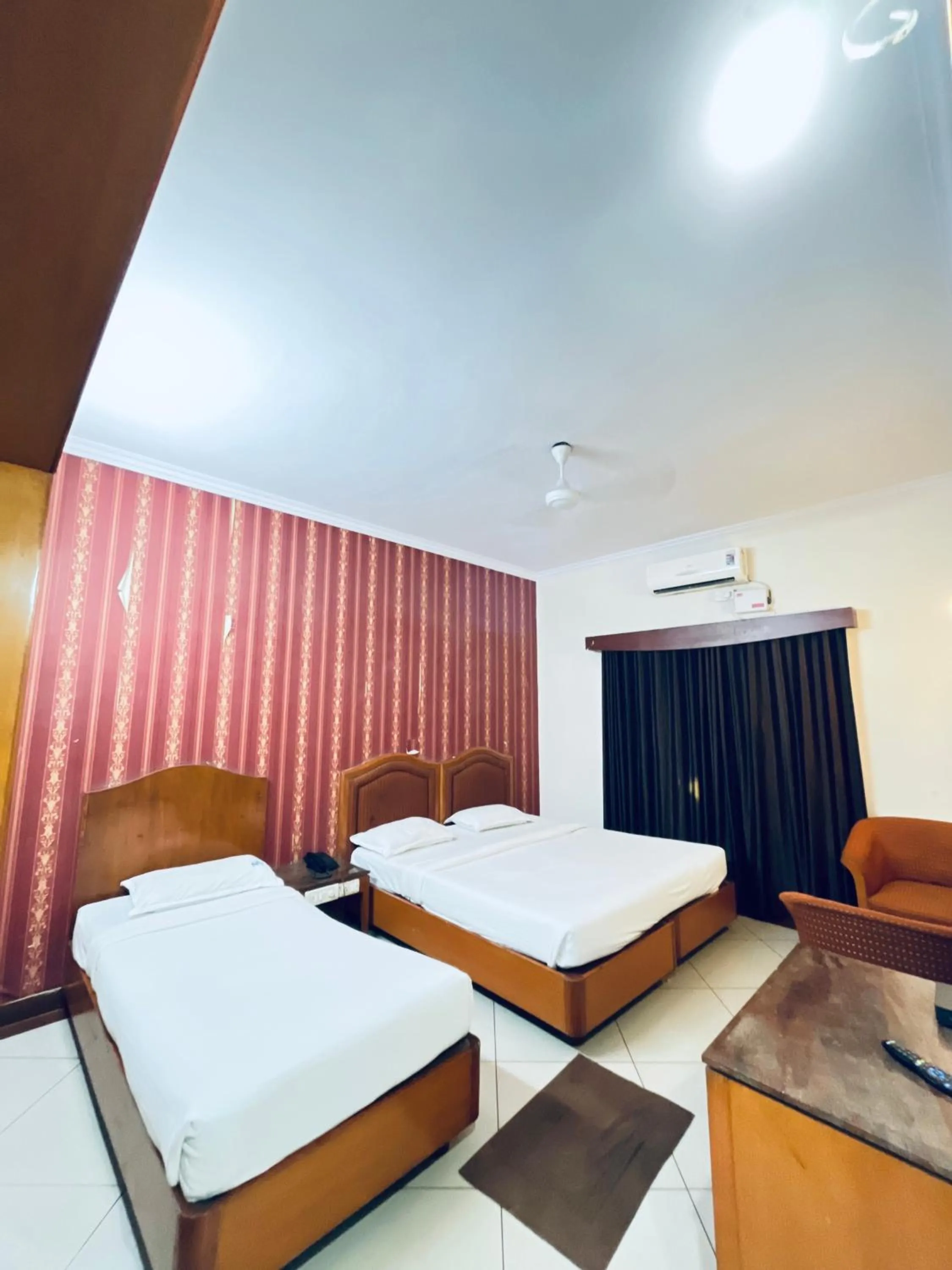 Bed in Hotel Chetan International