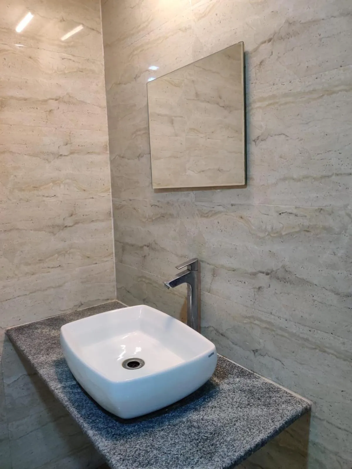 Bathroom in Hotel Chetan International