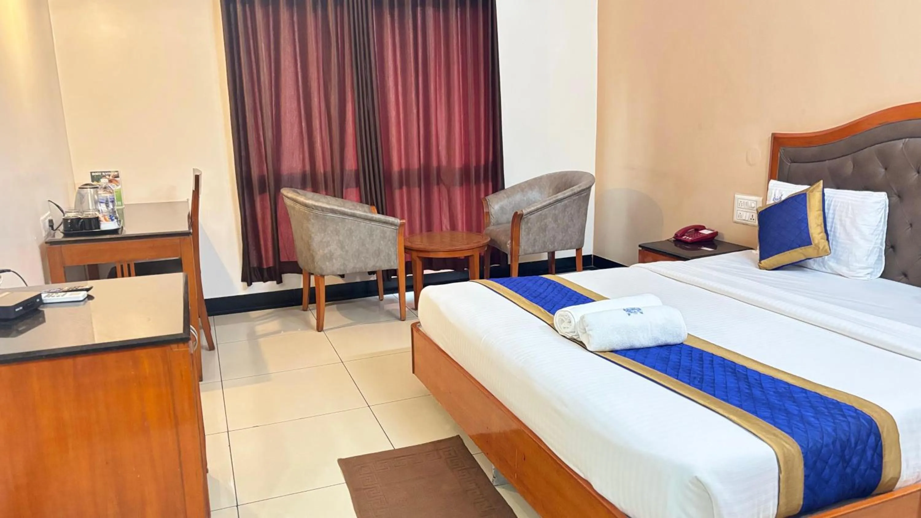 Bed in Hotel Chetan International