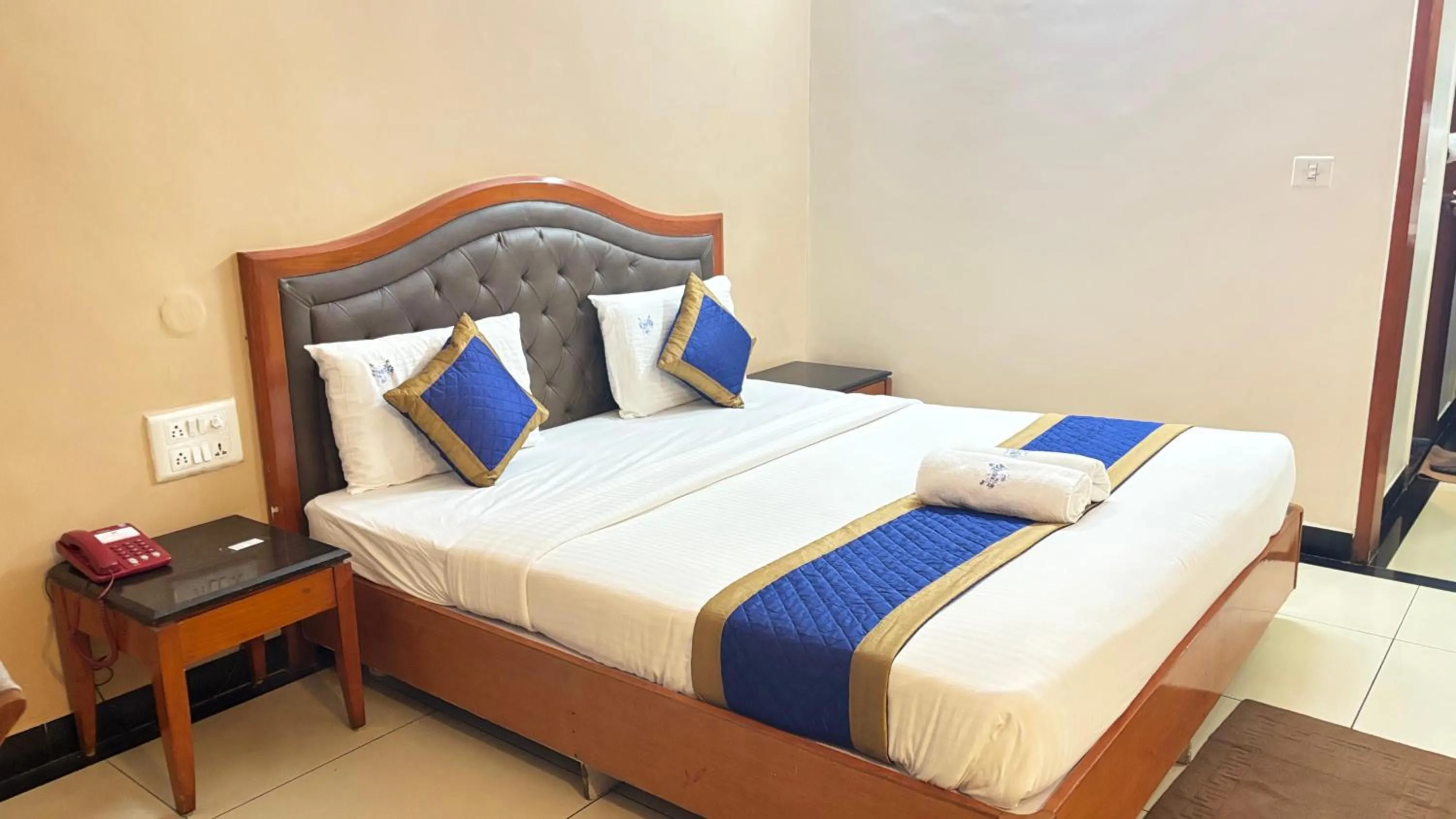 Bed in Hotel Chetan International