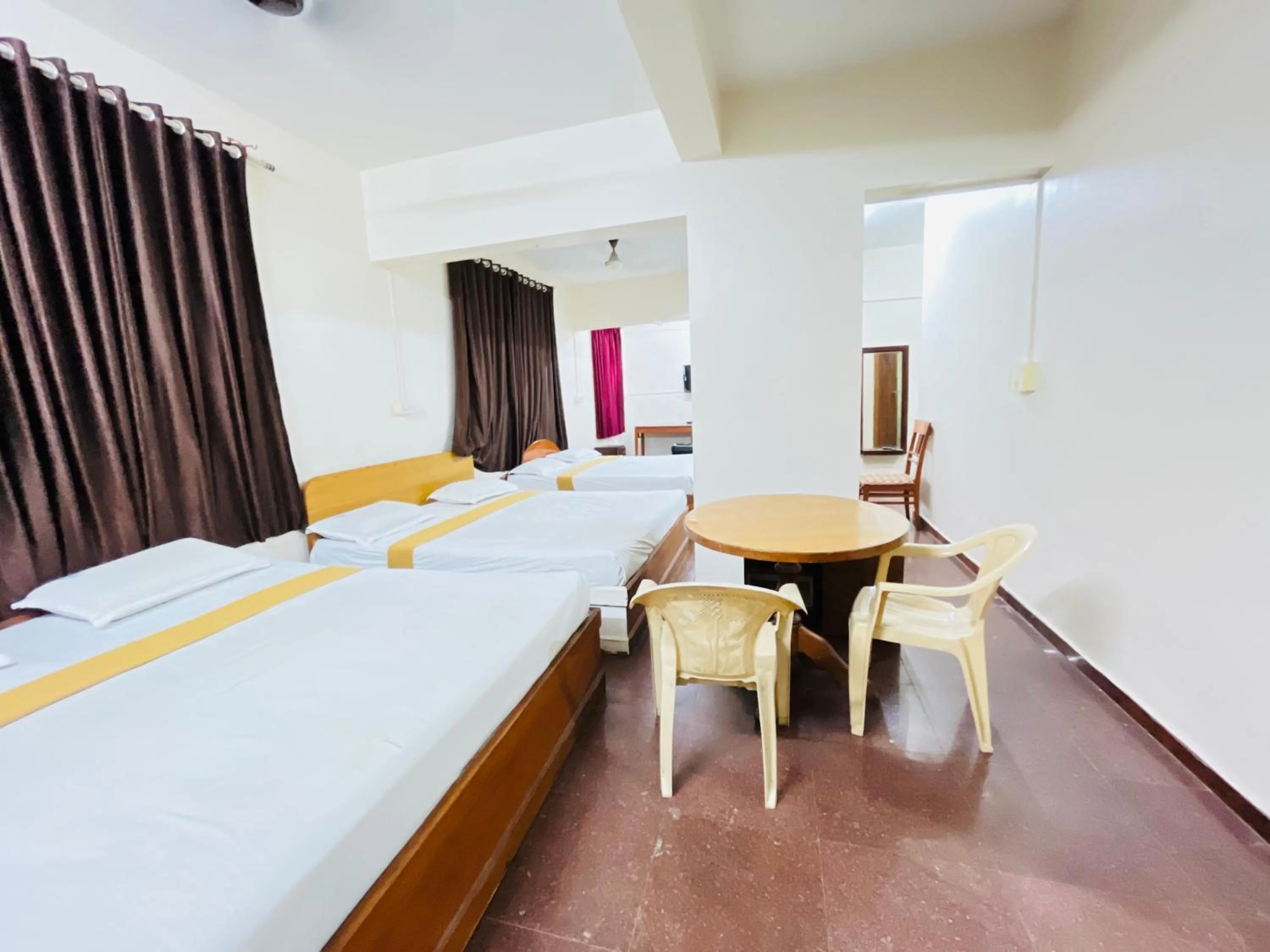 Bed in Hotel Chetan International