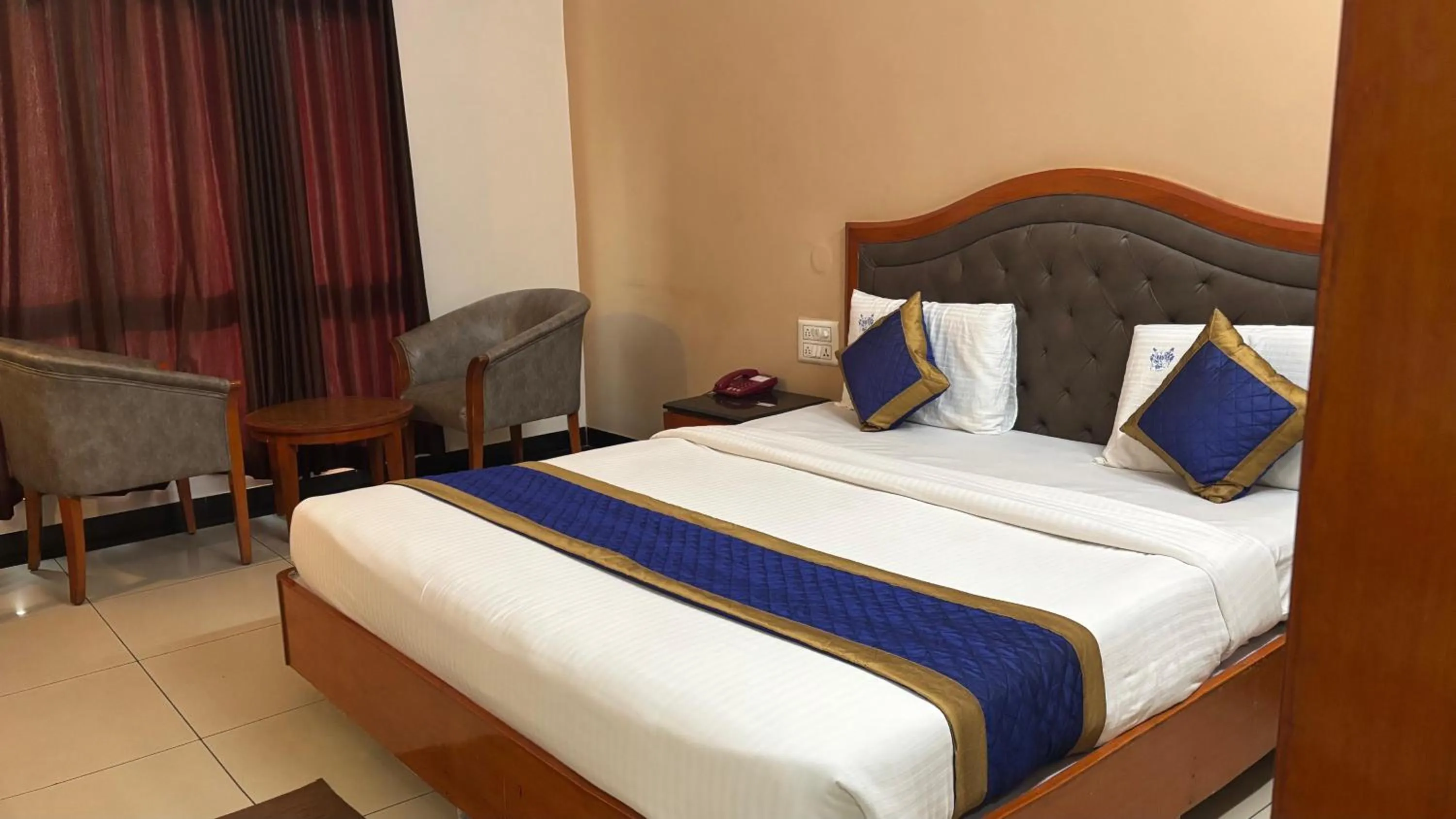 Bed in Hotel Chetan International