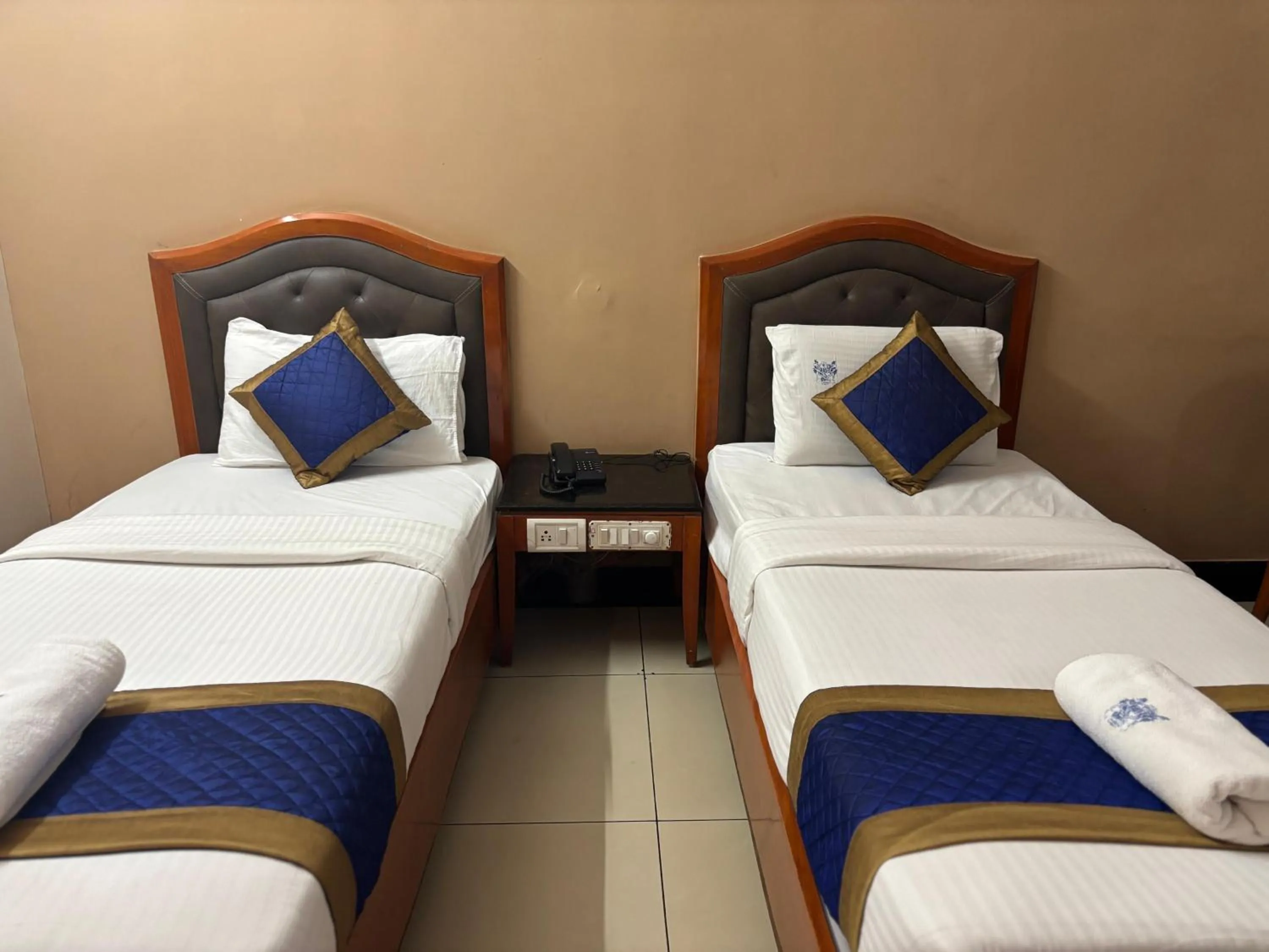 Bed in Hotel Chetan International