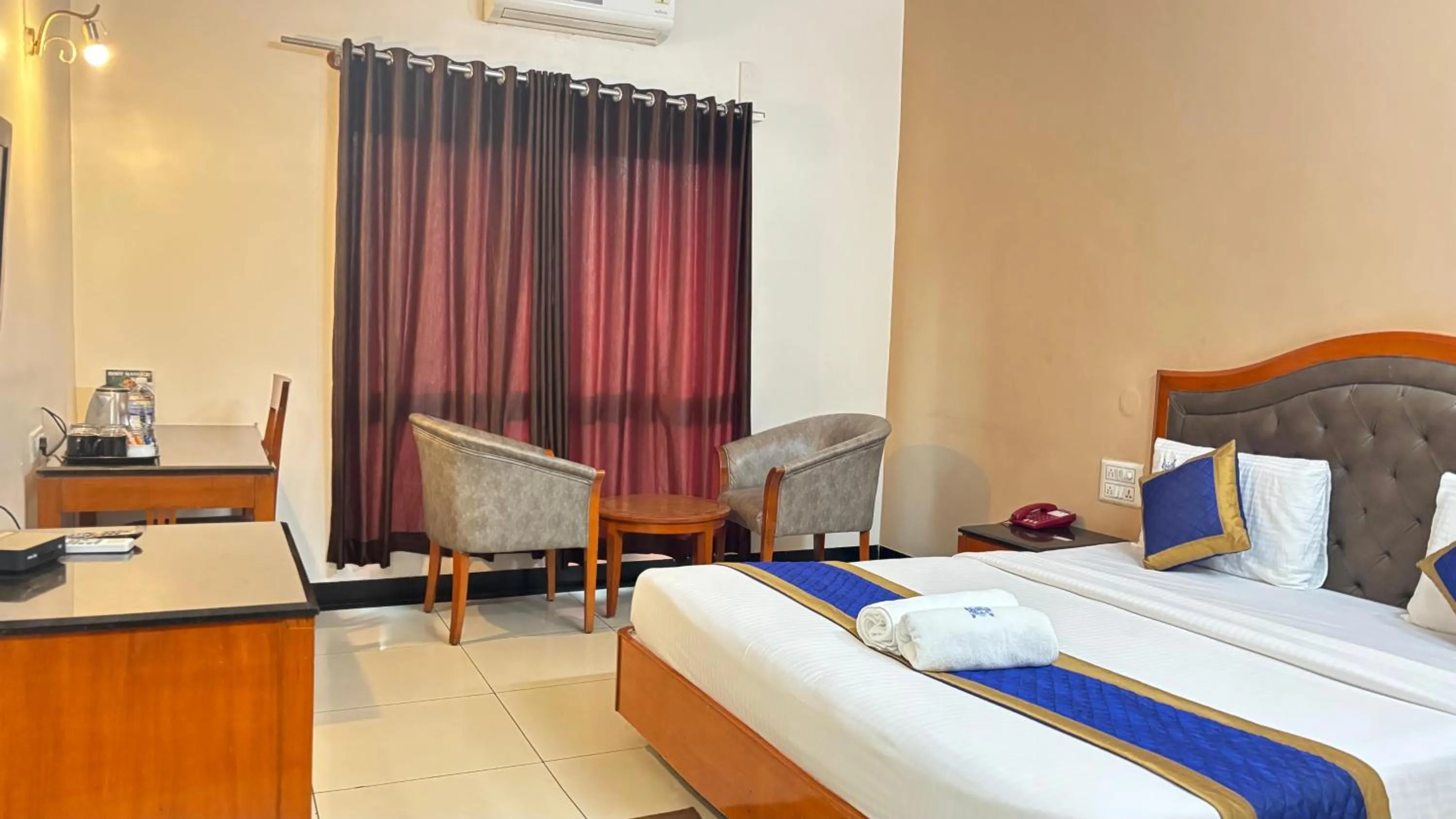 Bed in Hotel Chetan International