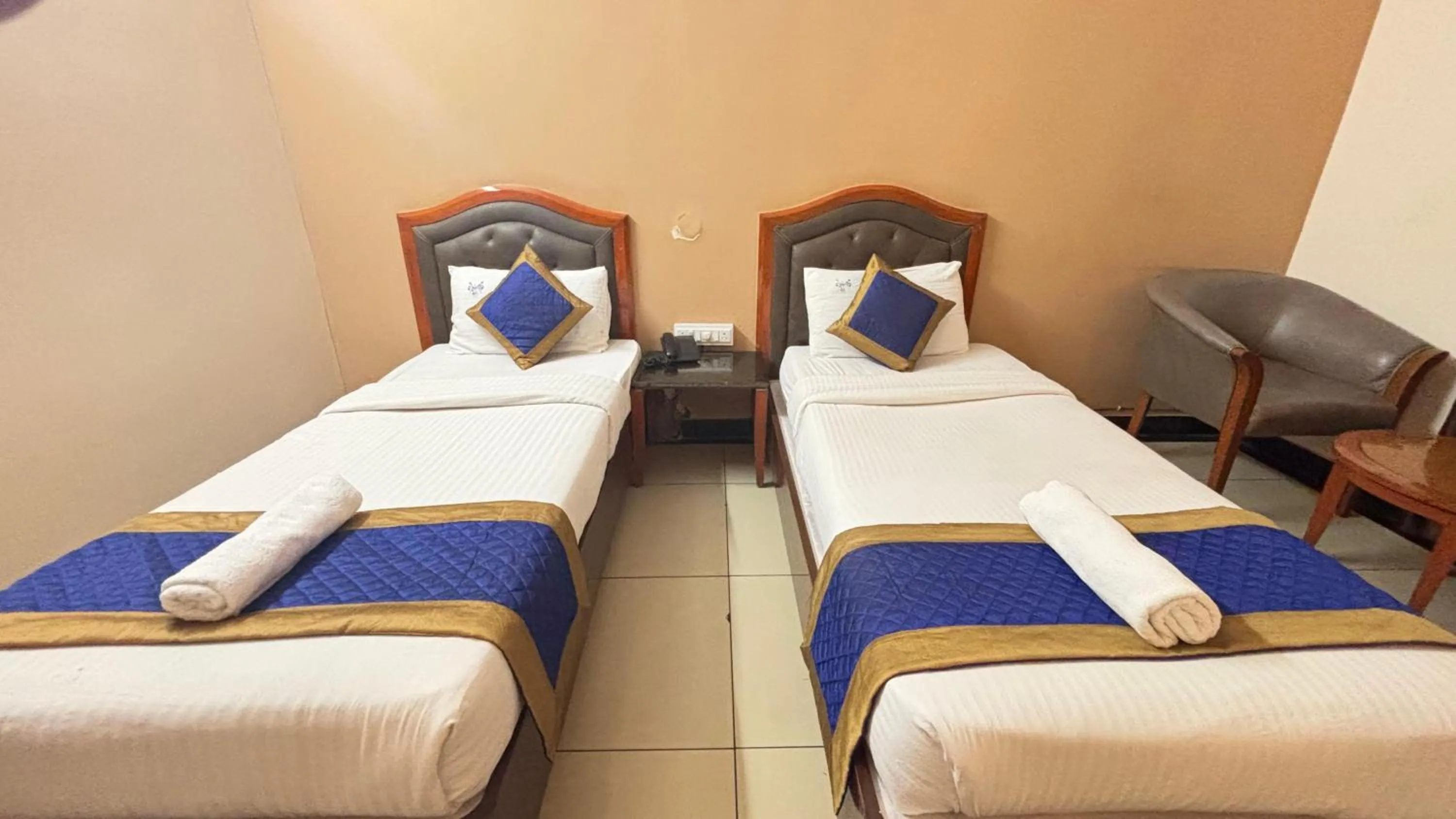 Bed in Hotel Chetan International