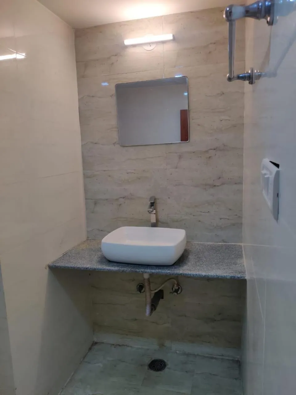 Bathroom in Hotel Chetan International