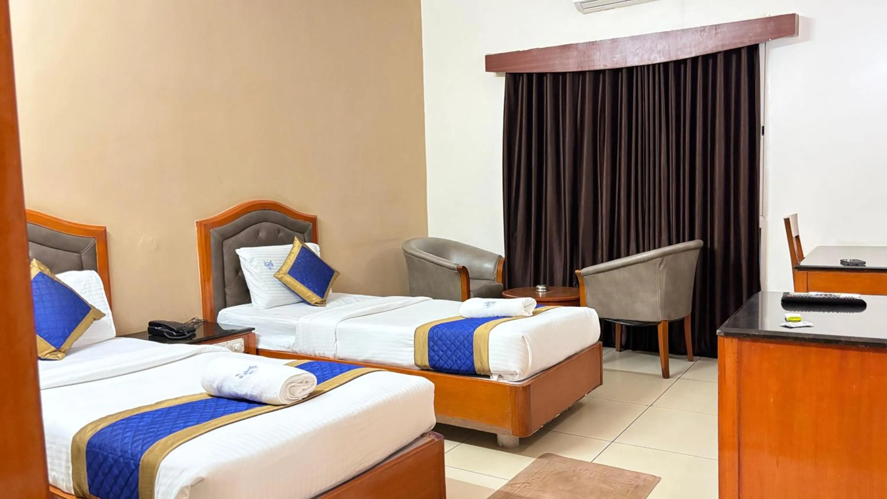 Bed in Hotel Chetan International