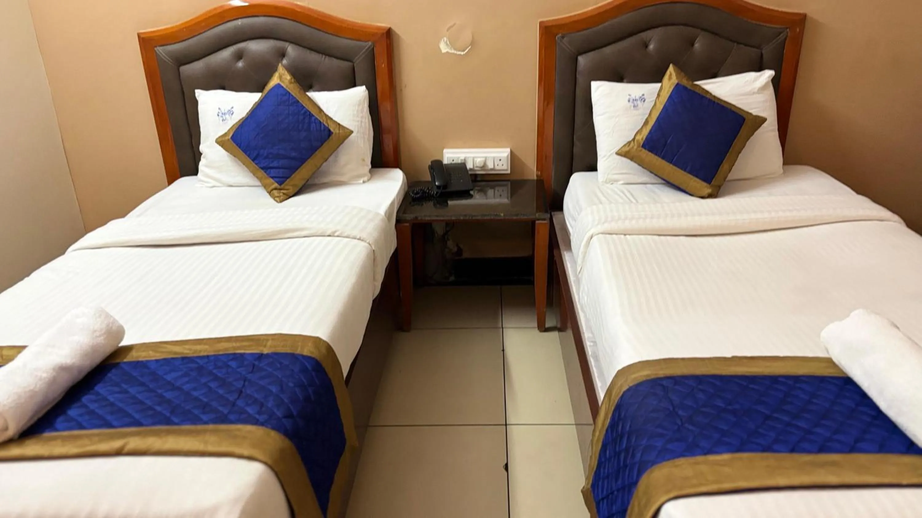 Bed in Hotel Chetan International