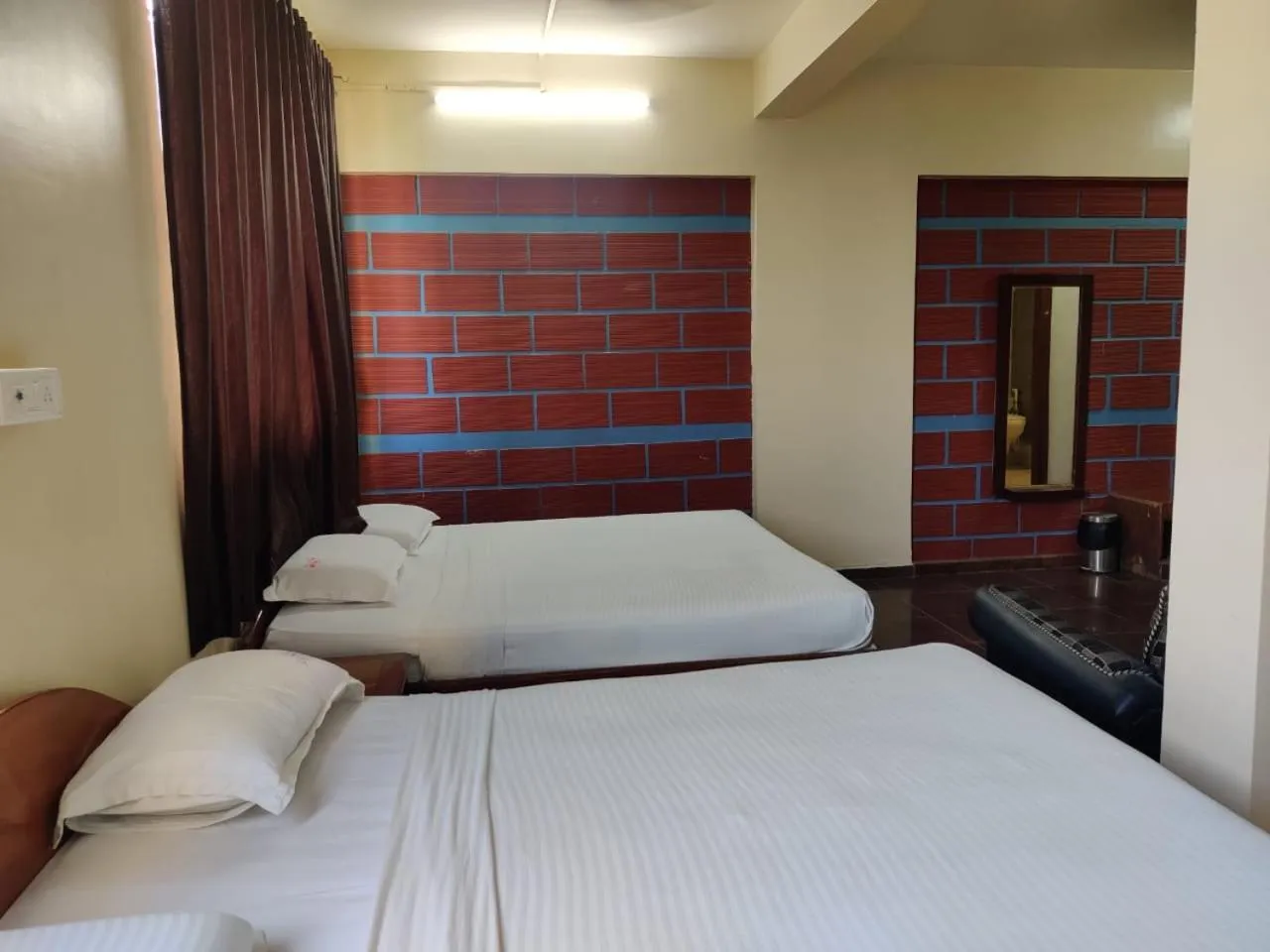 Bed in Hotel Chetan International