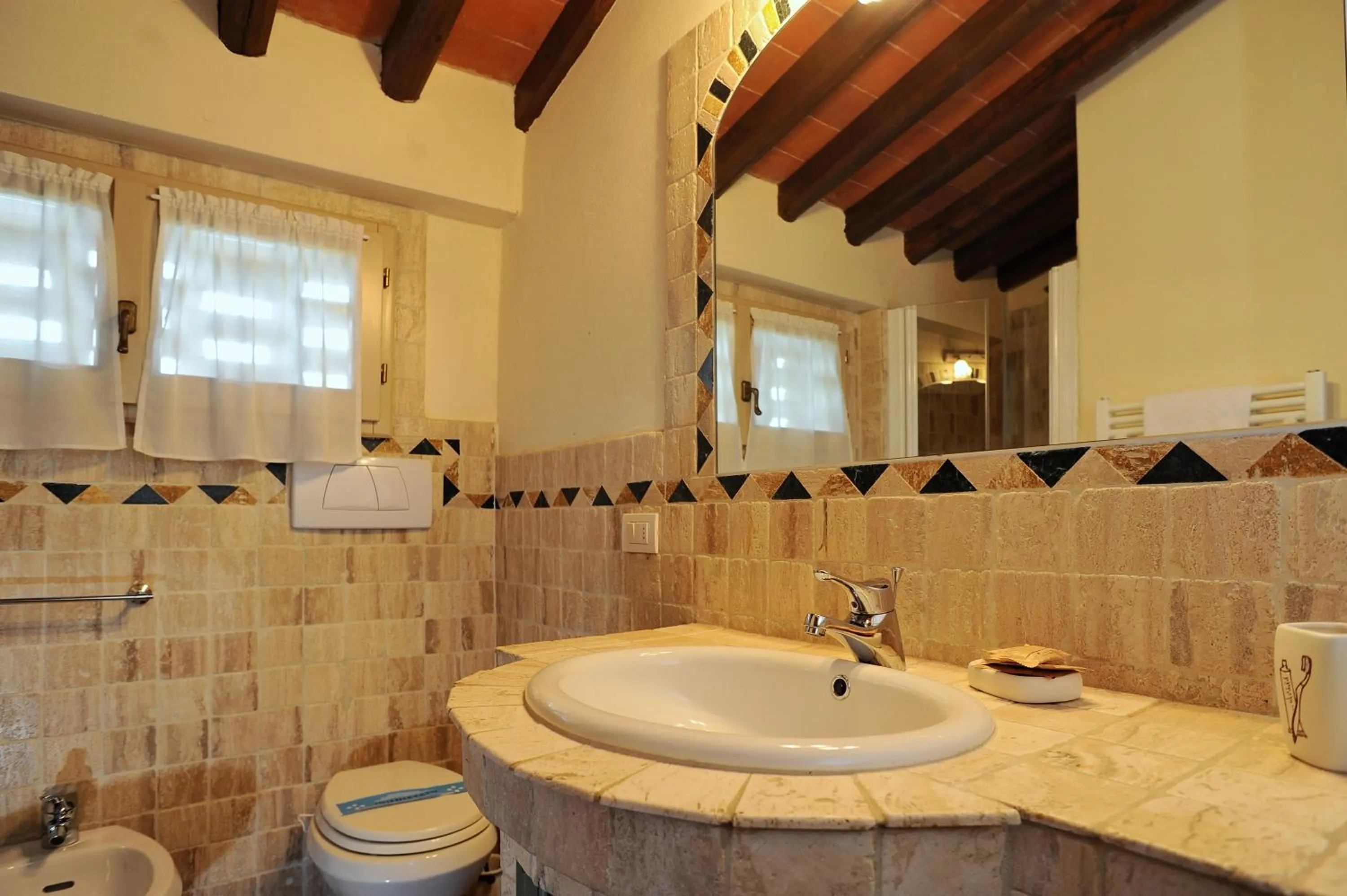 Bathroom in Erboli Residence