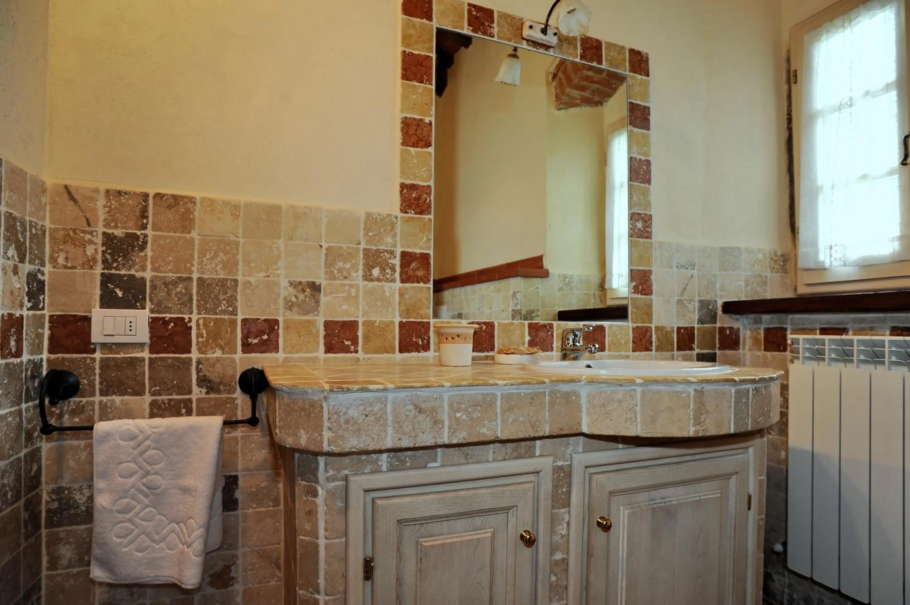 Bathroom in Erboli Residence