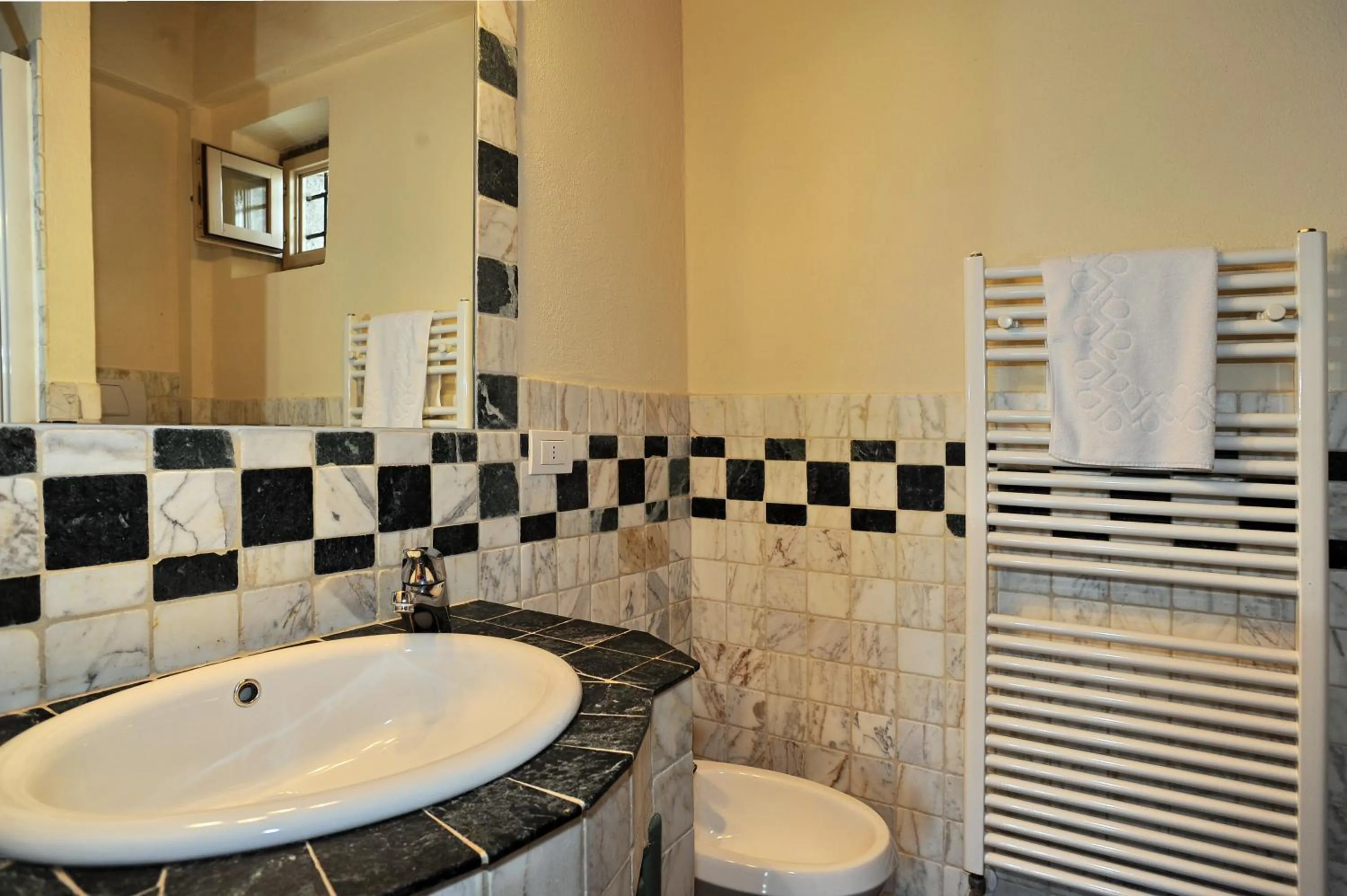 Bathroom in Erboli Residence