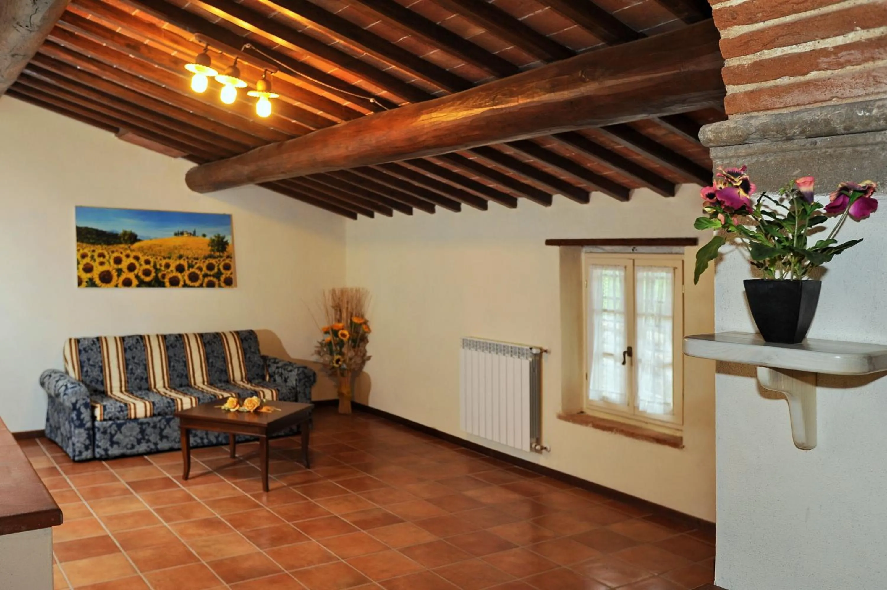 Seating area in Erboli Residence