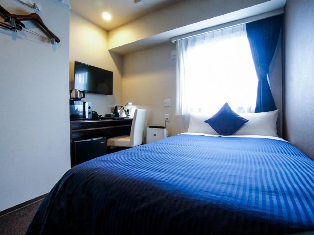 Bed in HOTEL LiVEMAX Kasai Ekimae