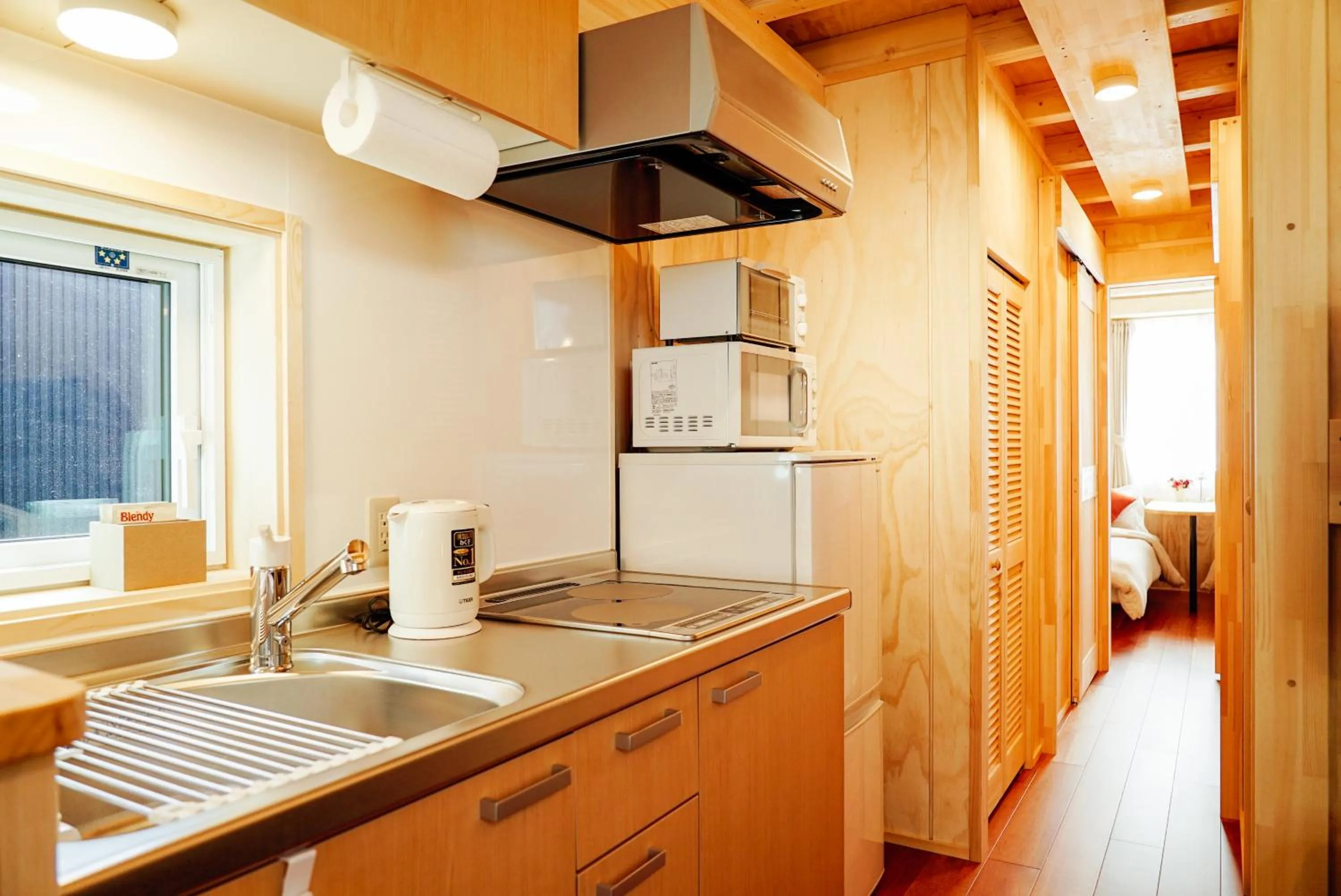 Kitchen or kitchenette in Jstyle STAY Furano