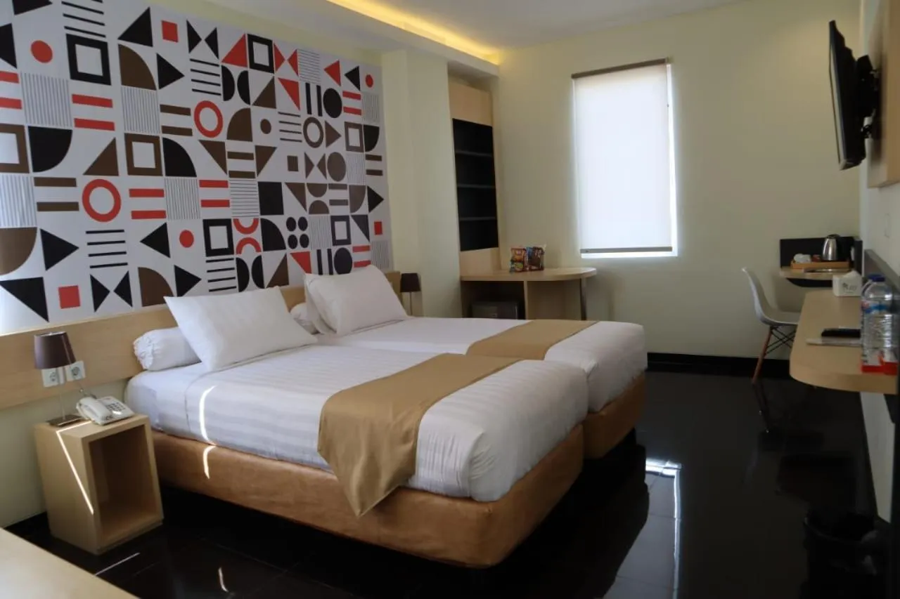 Bed in Front One Inn Kediri
