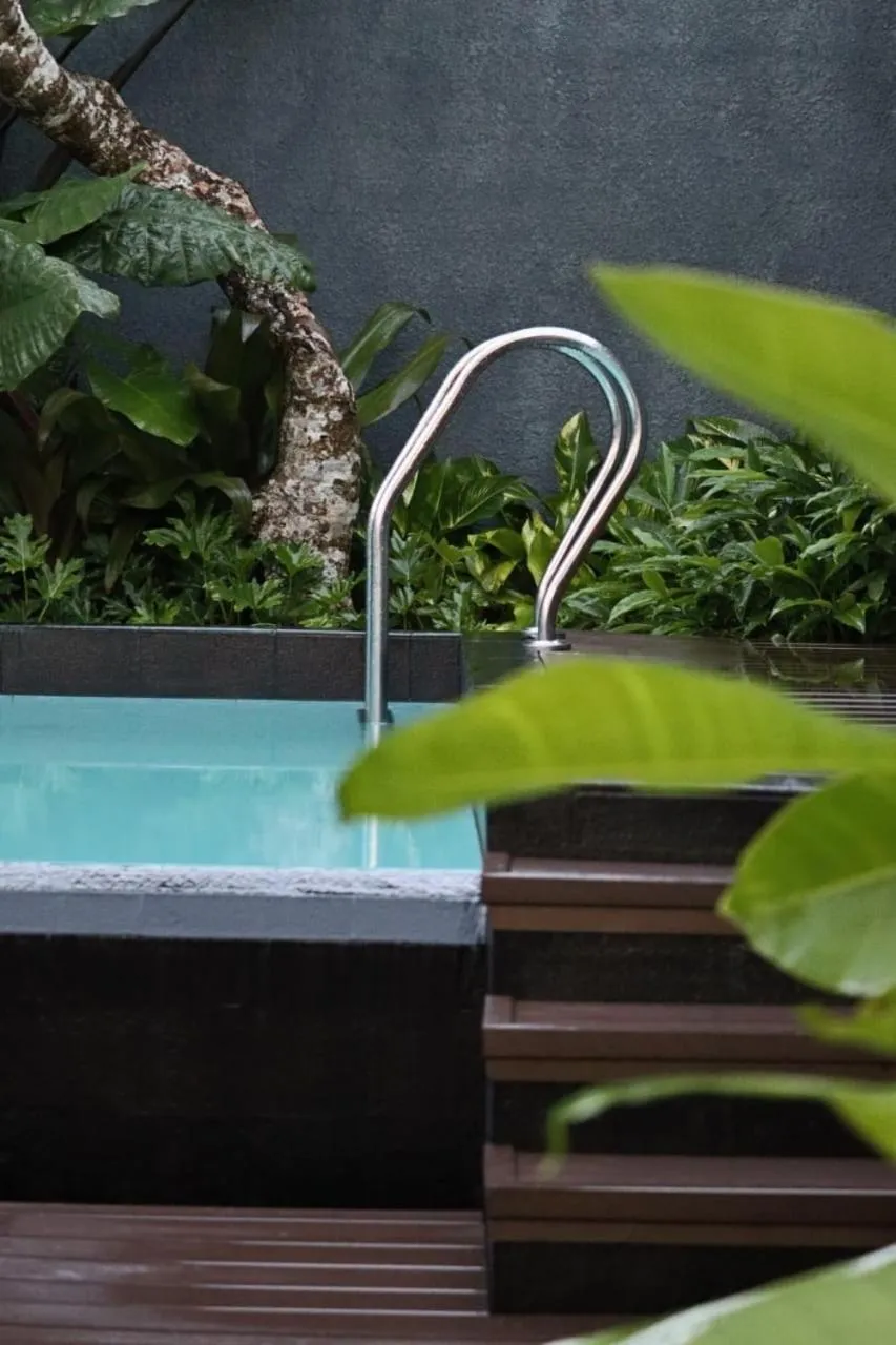 Swimming pool in Front One Inn Kediri