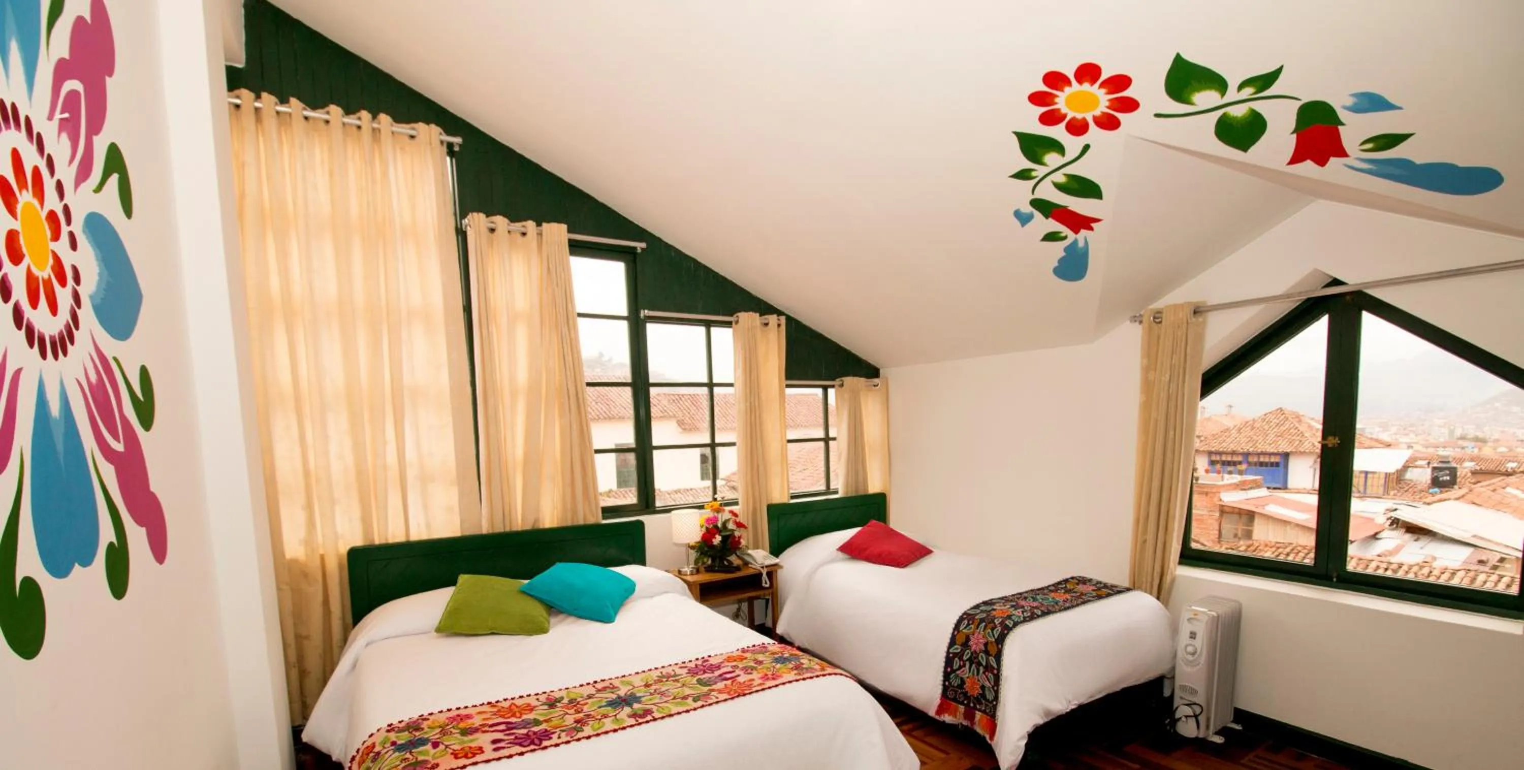 Landmark view, Bed in Cusco Plaza Nazarenas