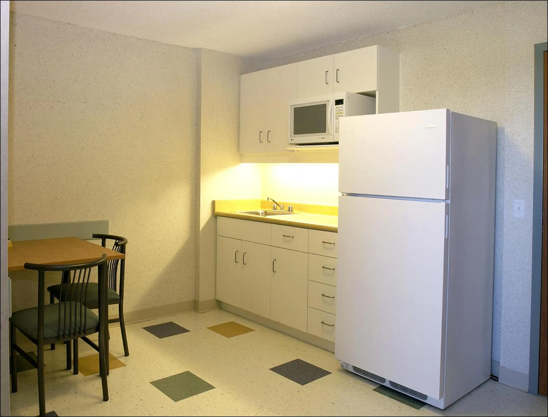 Kitchen or kitchenette in Residence & Conference Centre- Barrie