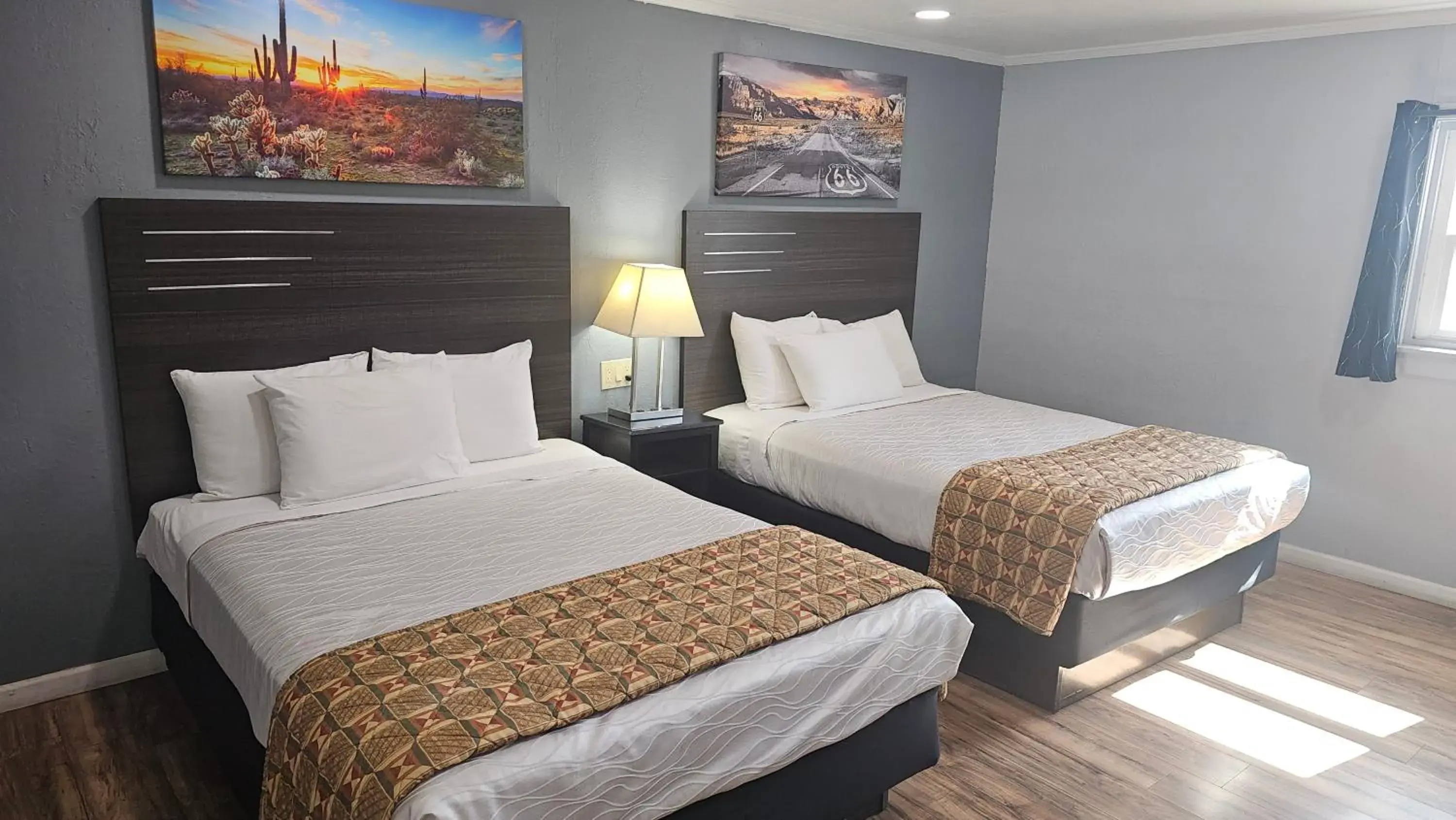 Queen Room with Two Queen Beds in Travelers Inn Queen Room with Two Queen Beds in Travelers Inn