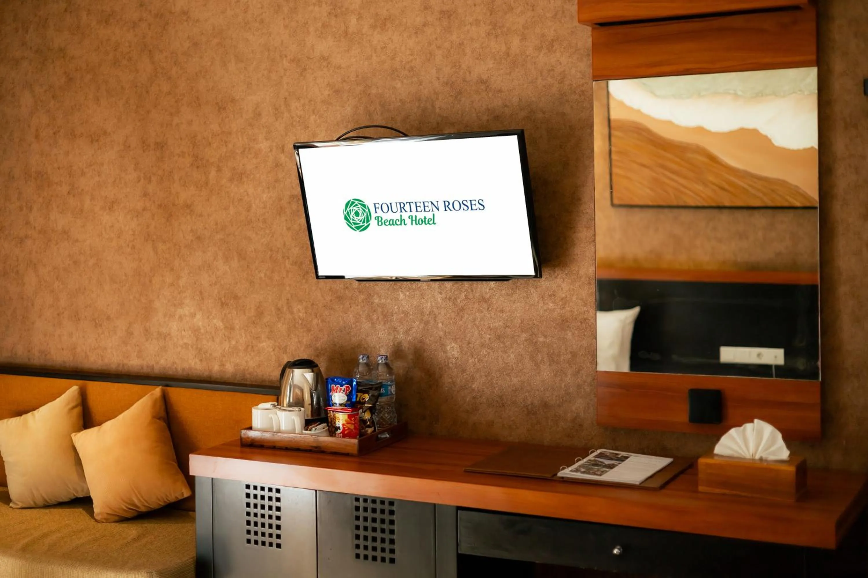 TV and multimedia in Fourteen Roses Beach Hotel