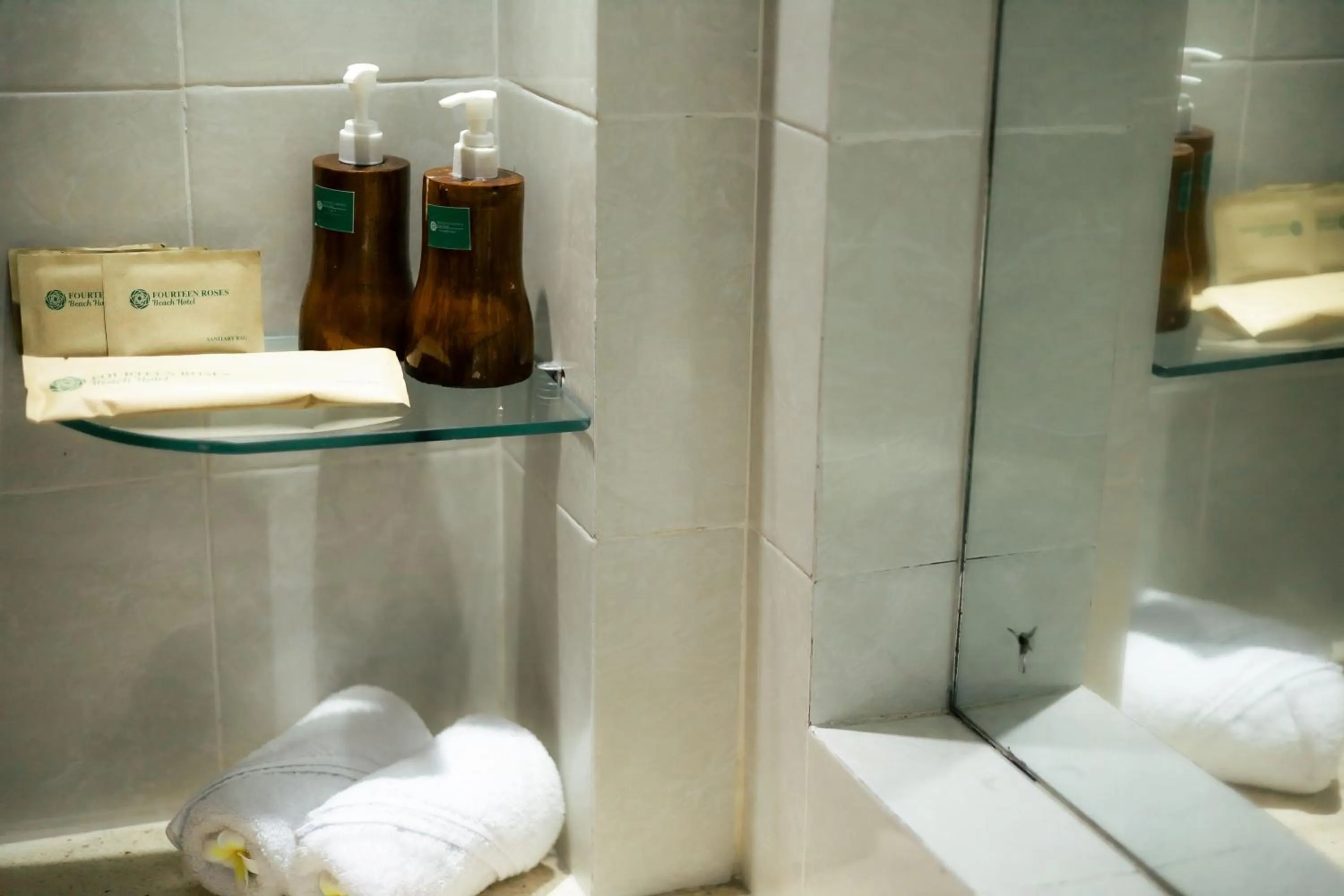 Bathroom in Fourteen Roses Beach Hotel