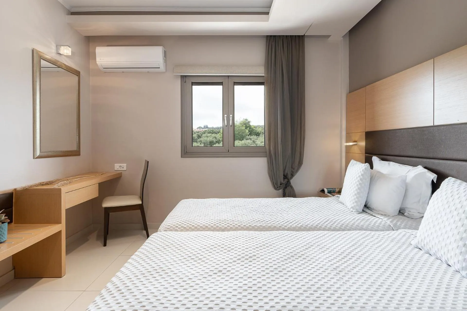 Bed in Kymothoe Elite Suites