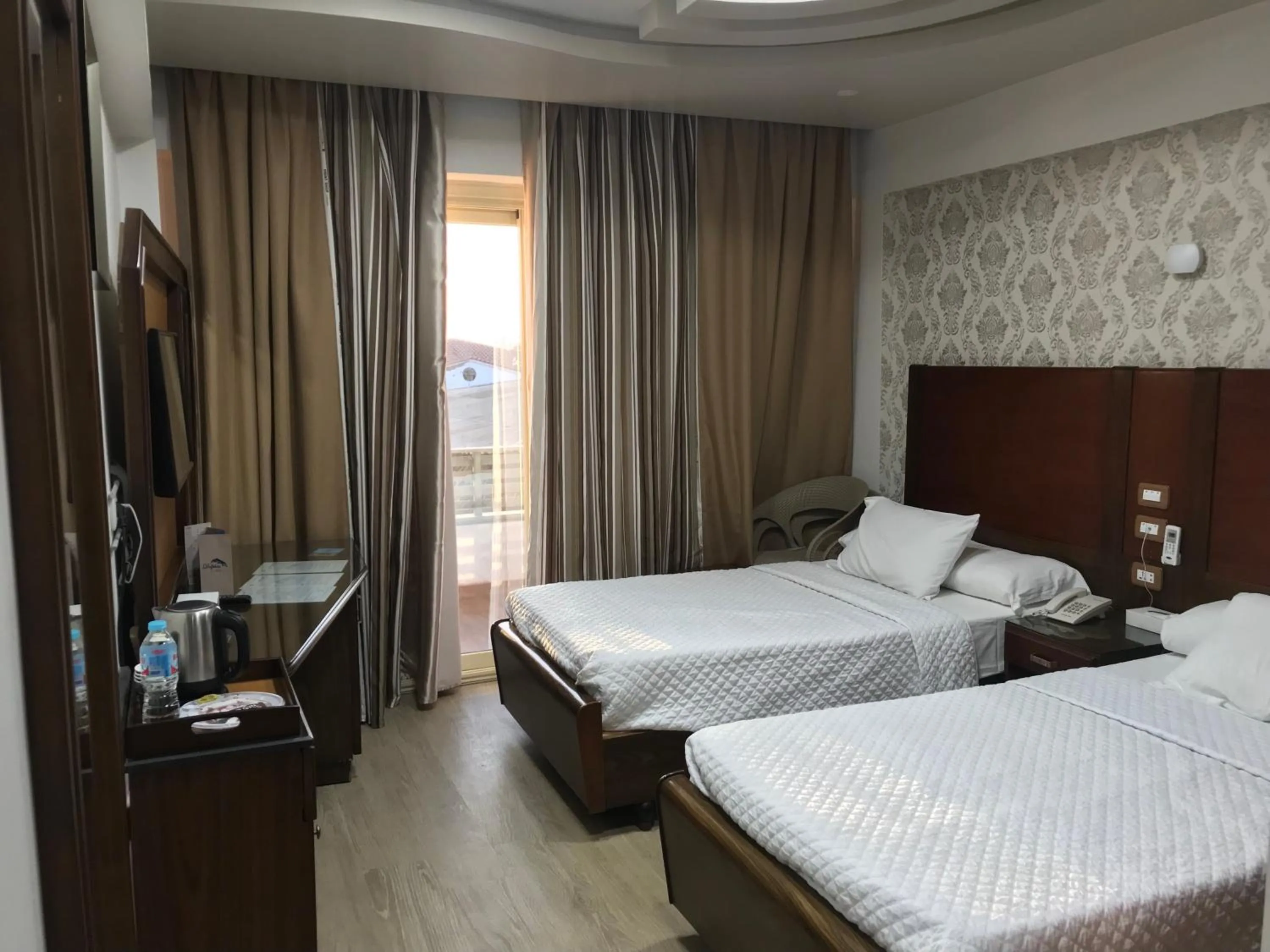 Photo of the whole room, Bed in Dolphin Ras El-Bar Hotel