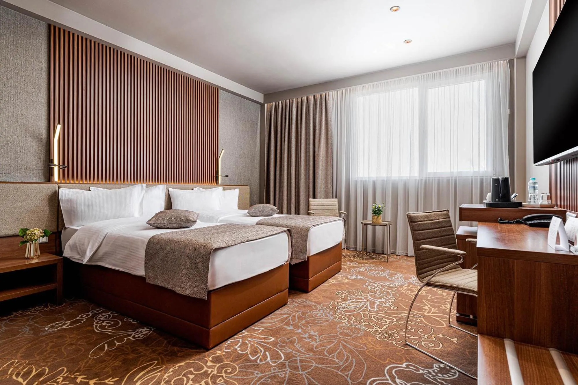 Communal lounge/ TV room, Bed in RIN Airport Hotel