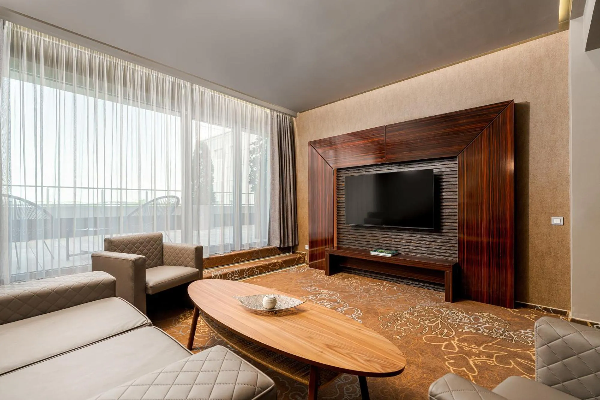 Communal lounge/ TV room in RIN Airport Hotel