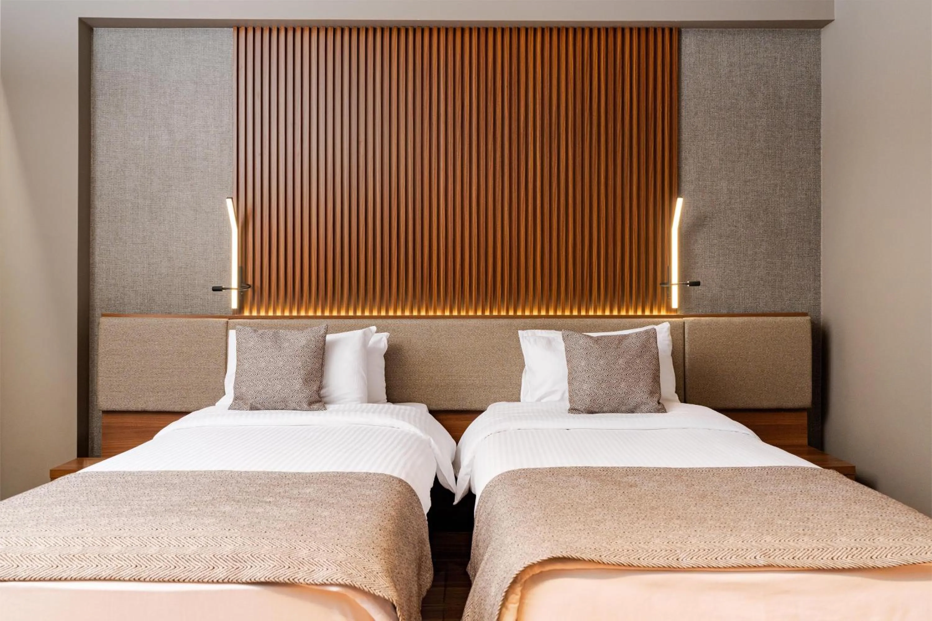 Bed in RIN Airport Hotel