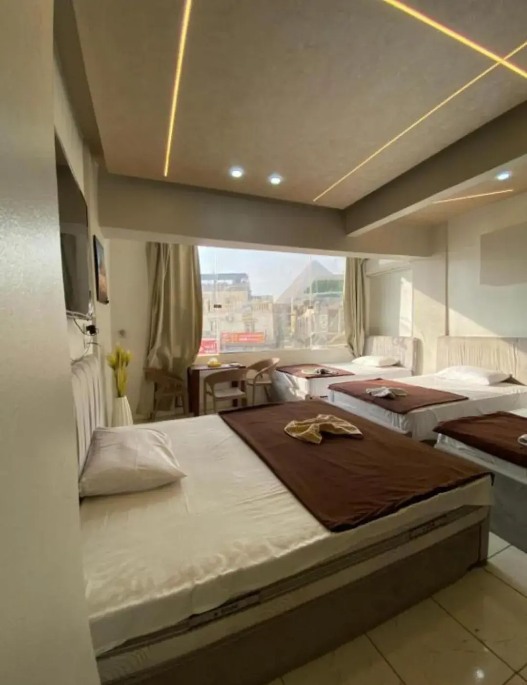 Family Room with Mountain View in Pyramids Family Inn Family Room with Mountain View in Pyramids Family Inn