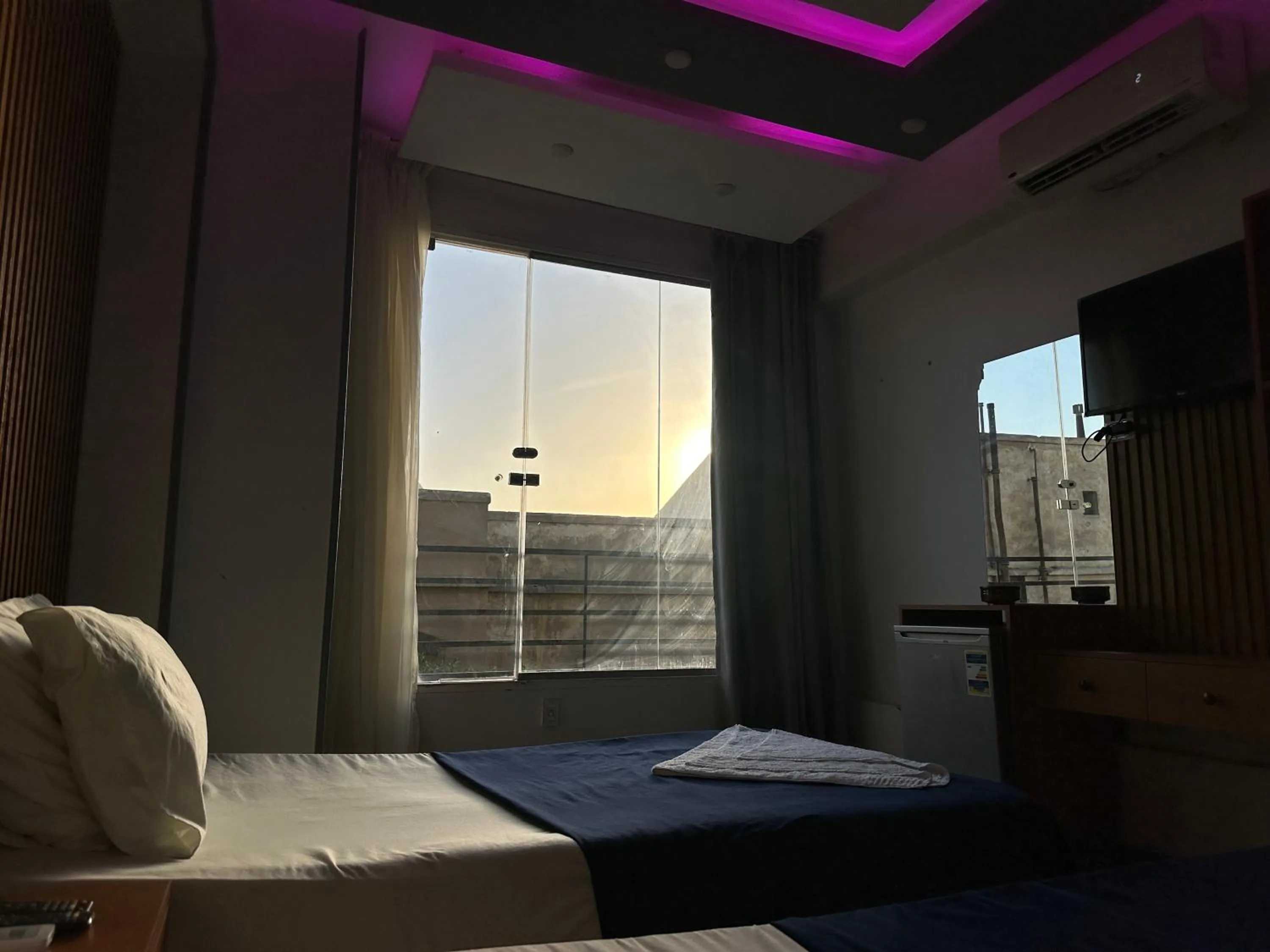 Bed in Pyramids Family Inn