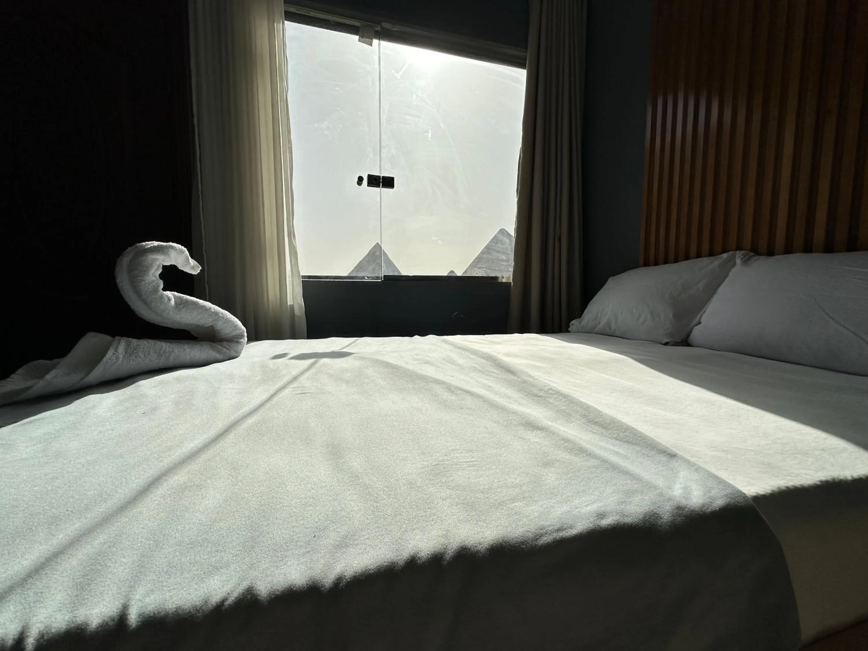 Bed in Pyramids Family Inn