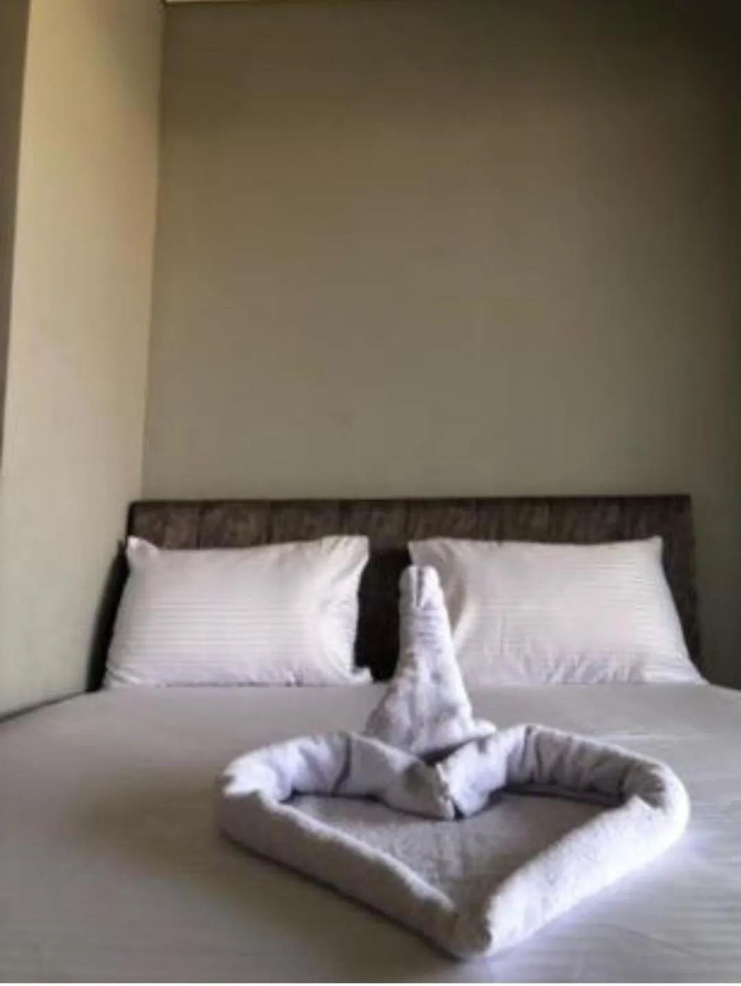 Bed in Pyramids Family Inn