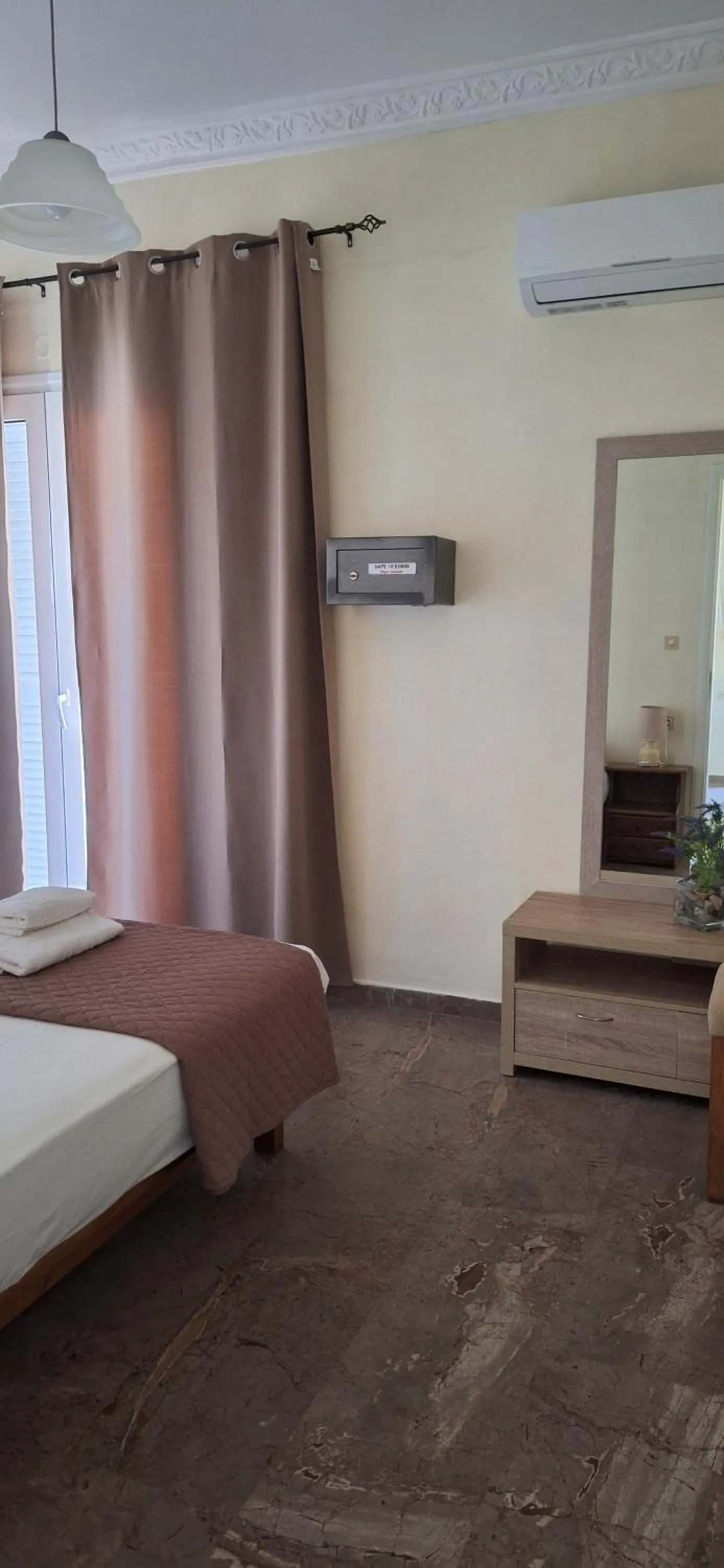 Bed in Nicolas Studios & Apartments