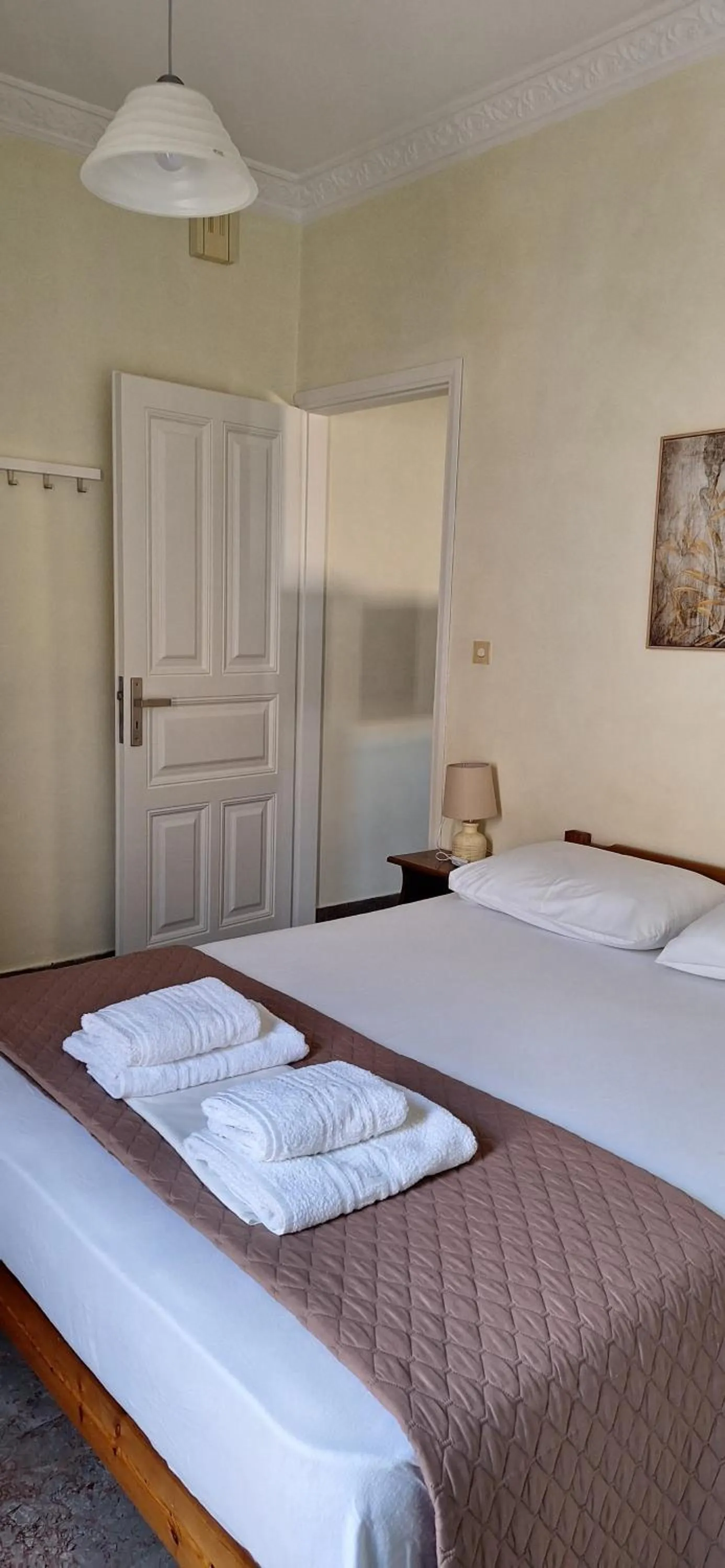 Bed in Nicolas Studios & Apartments