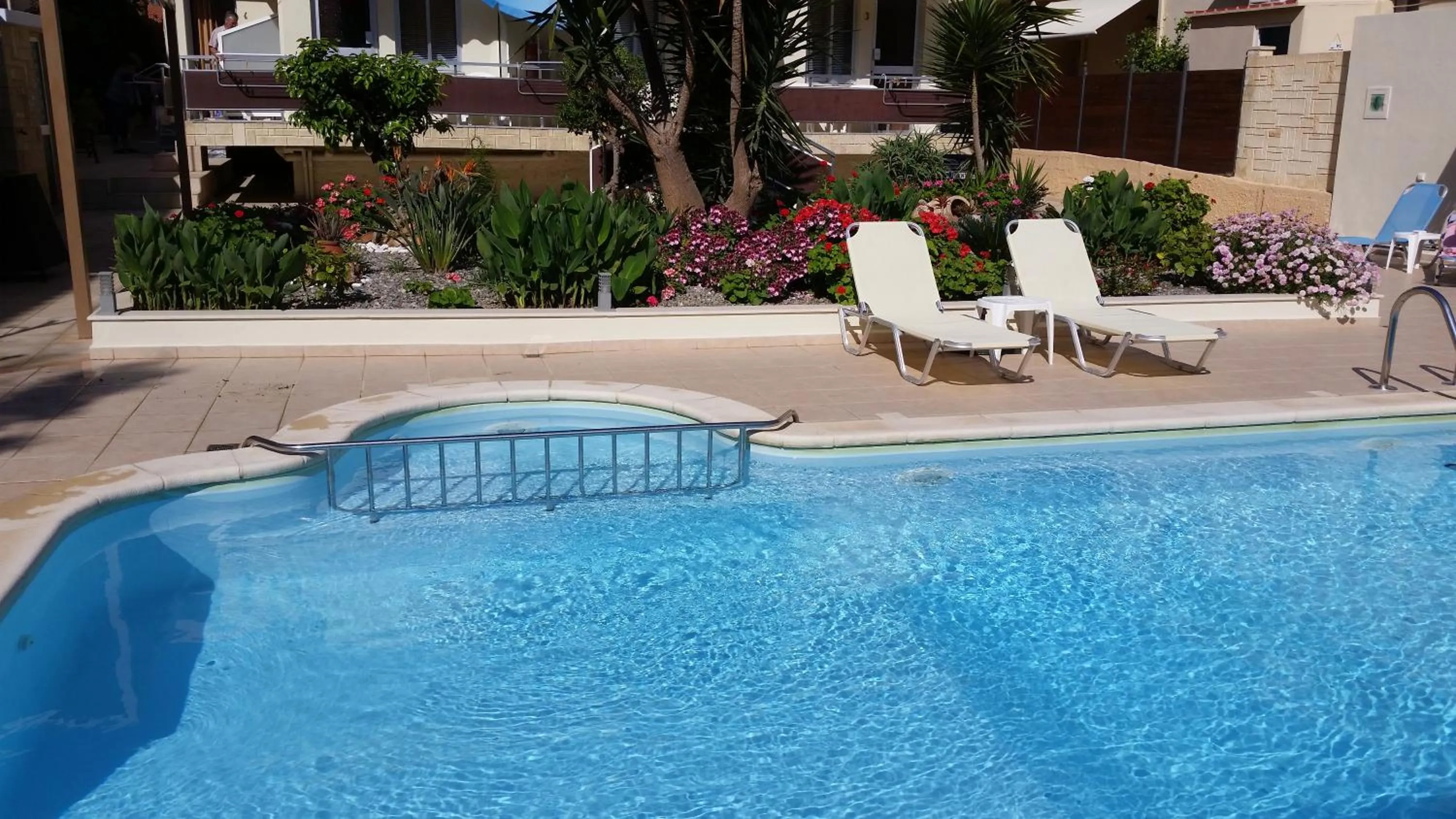 Pool view in Nicolas Studios & Apartments
