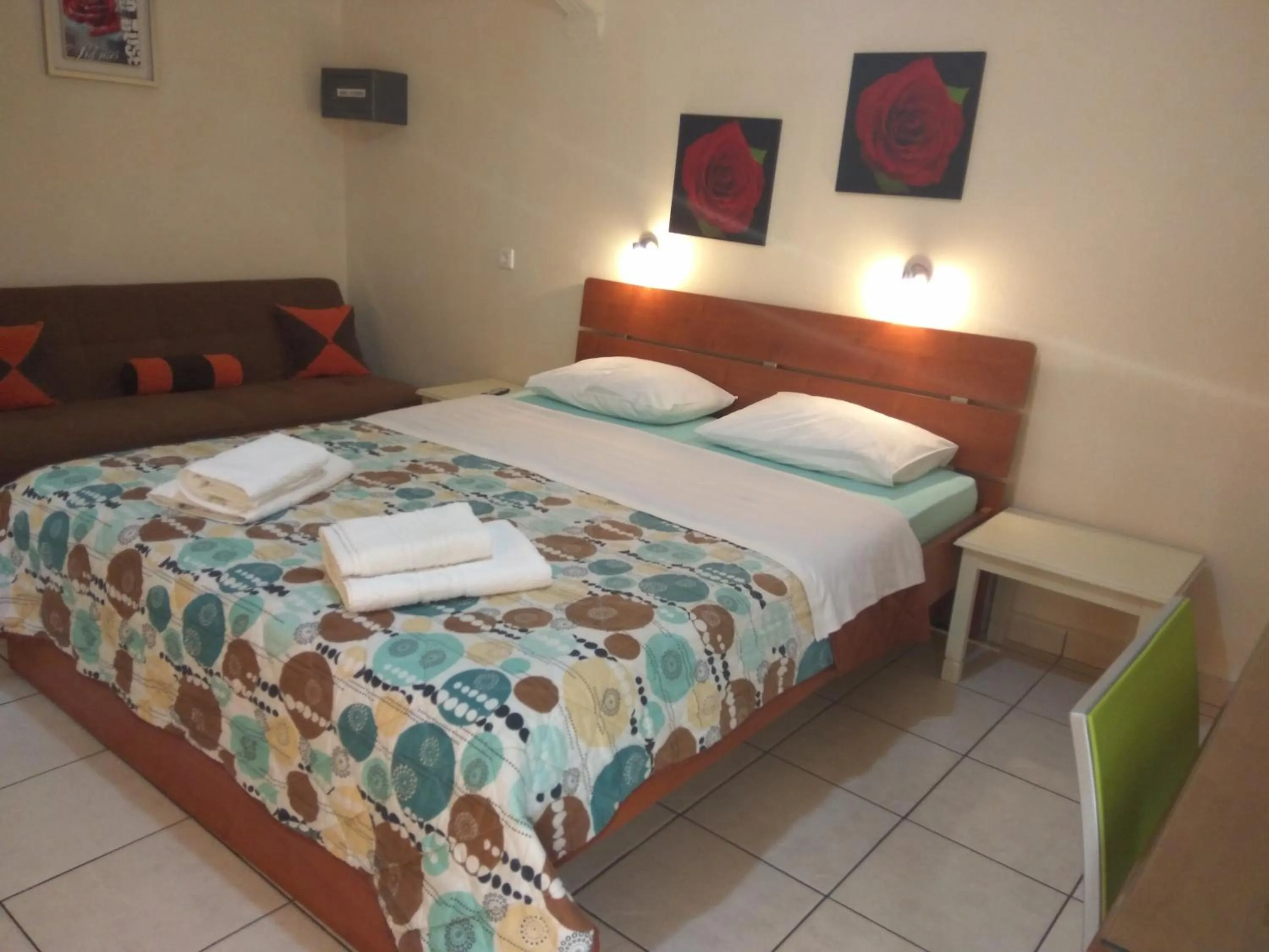 Bed in Nicolas Studios & Apartments