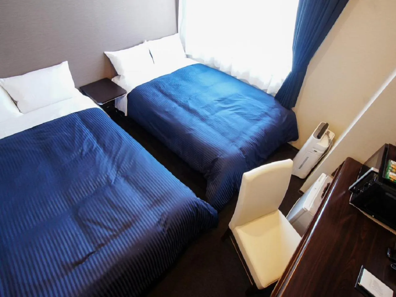 Bed in HOTEL LiVEMAX Yokohama Motomachi Ekimae