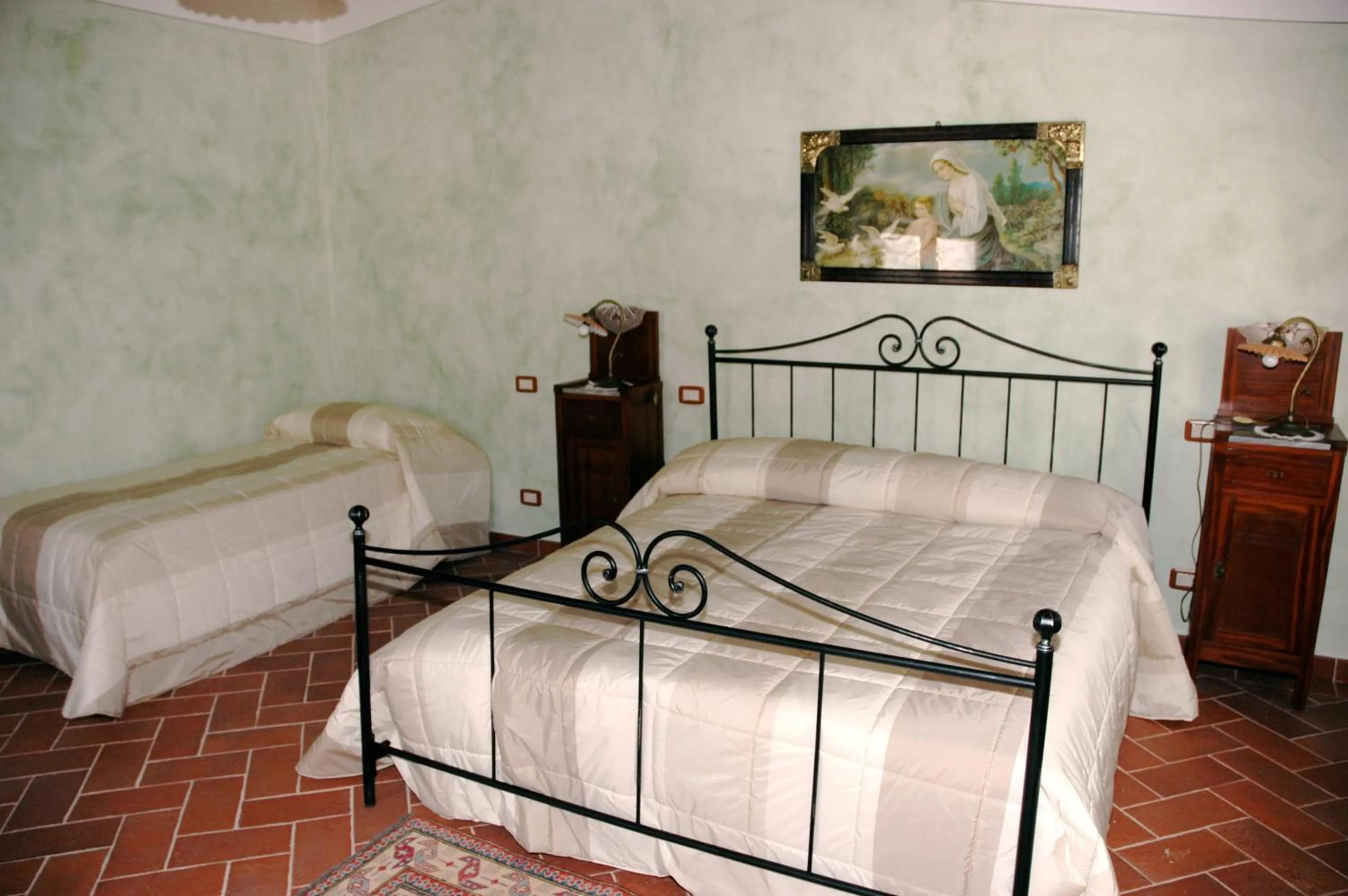 Bed in Piccolo Hotel San Valentino