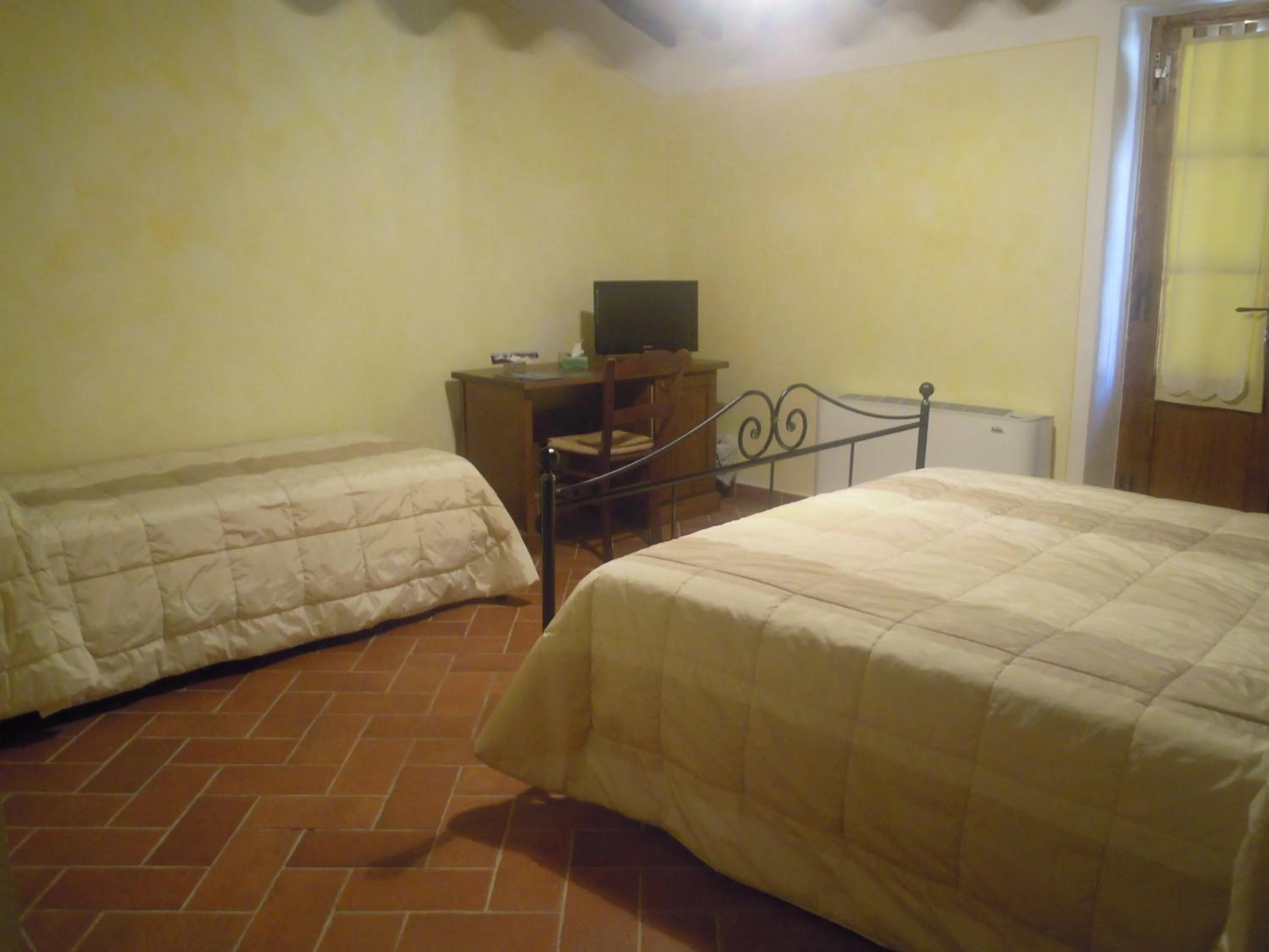 Bed in Piccolo Hotel San Valentino