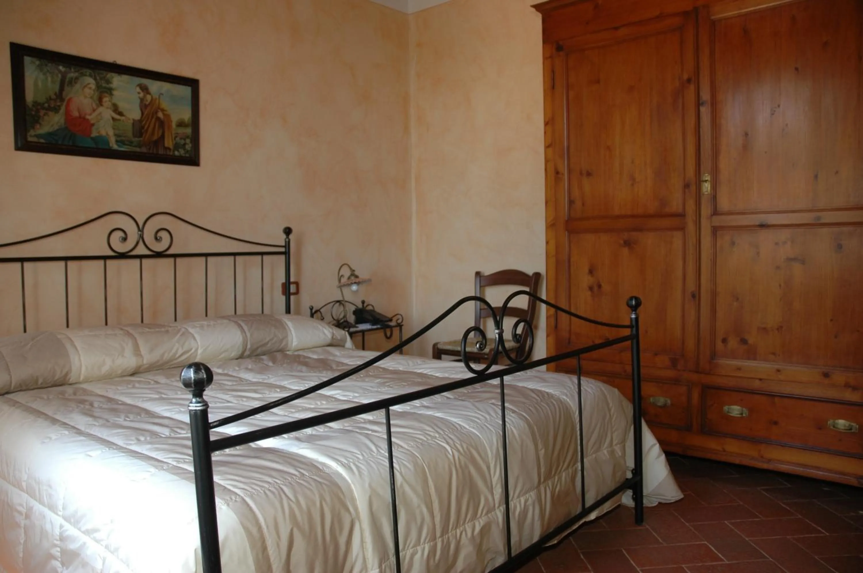 Bed in Piccolo Hotel San Valentino