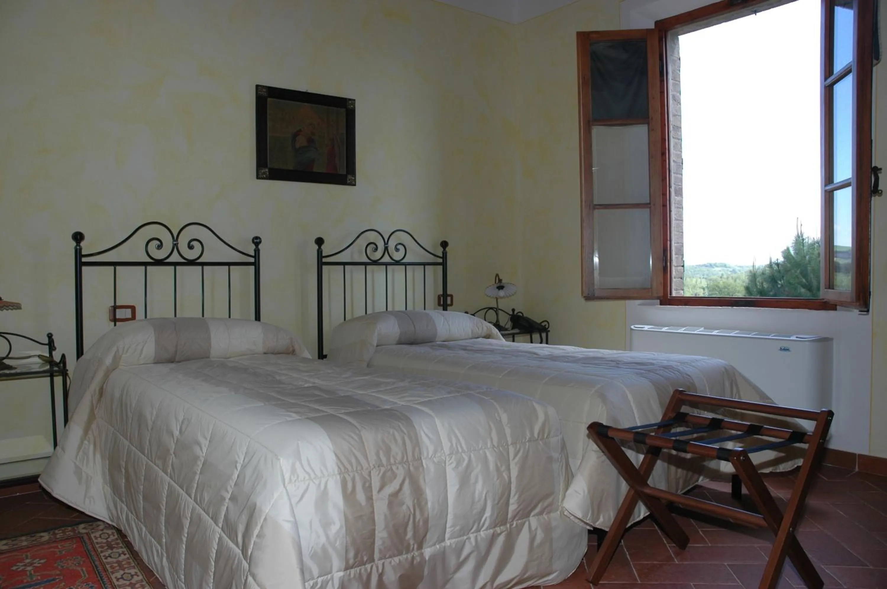 Bed in Piccolo Hotel San Valentino