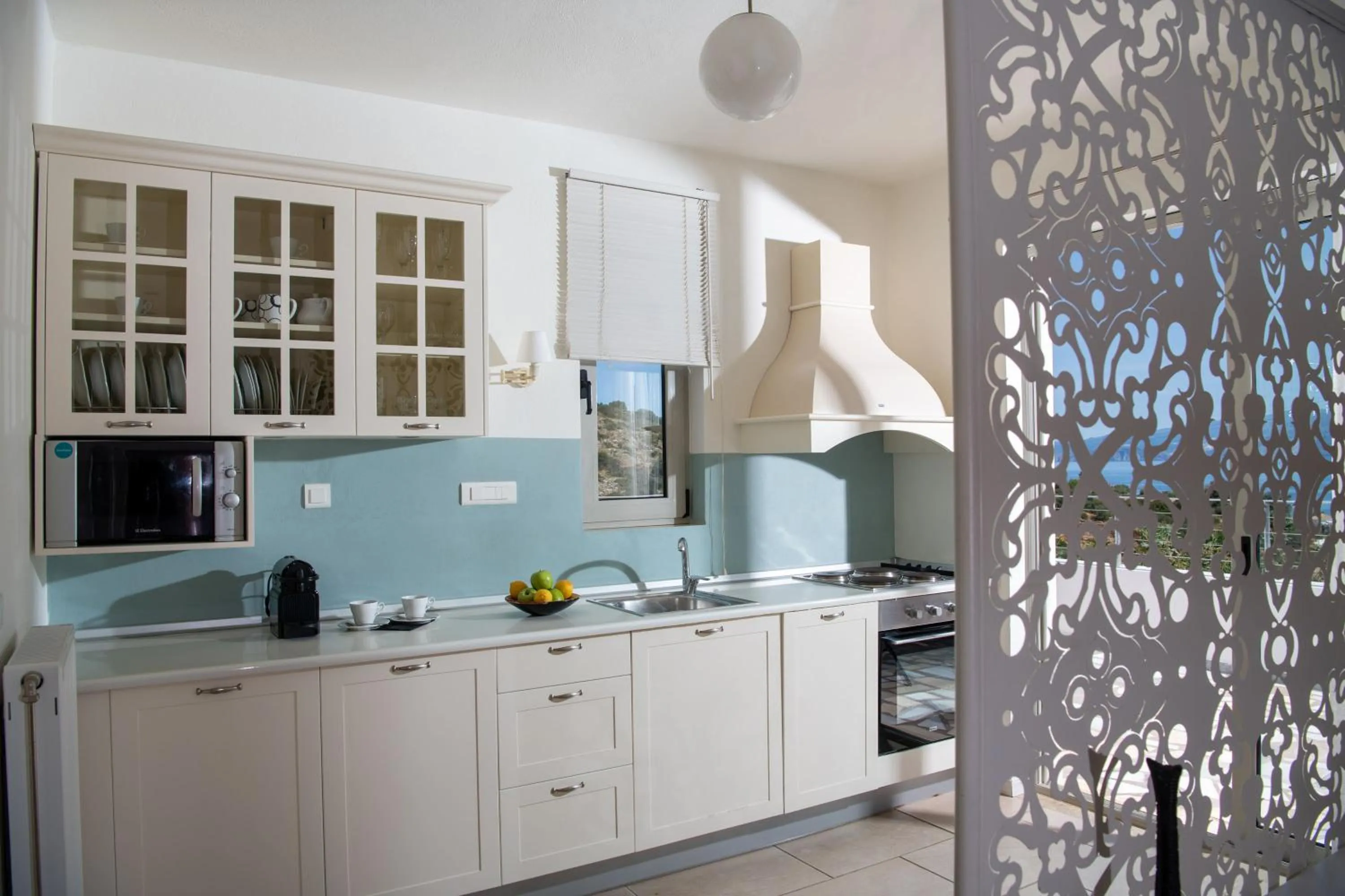 Kitchen or kitchenette in Pleiades Luxurious Villas