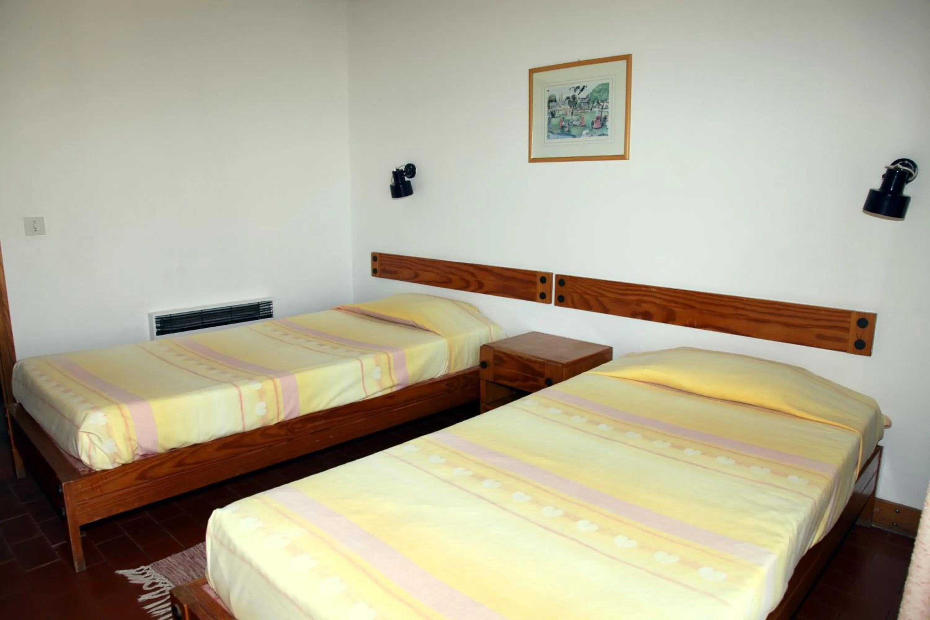 Bed in Apartamentos Guadiana