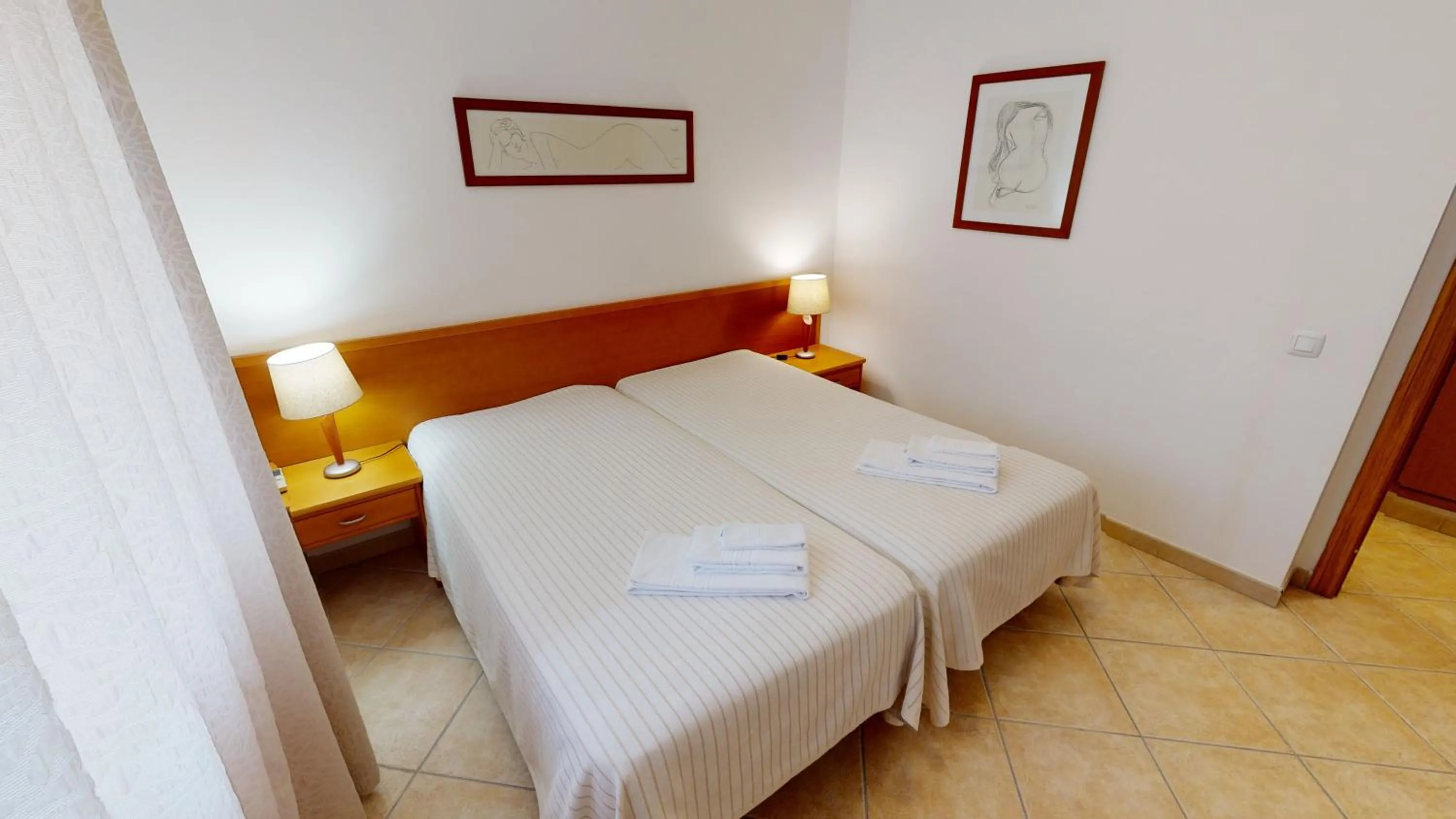 Bedroom, Bed in Praia da Lota Beachfront Resort - Hotel & Apartments