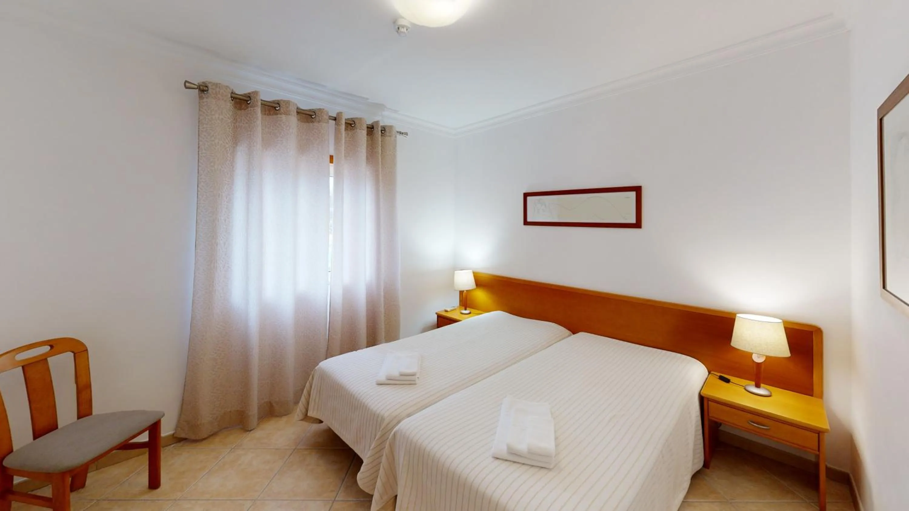 Bedroom, Bed in Praia da Lota Beachfront Resort - Hotel & Apartments