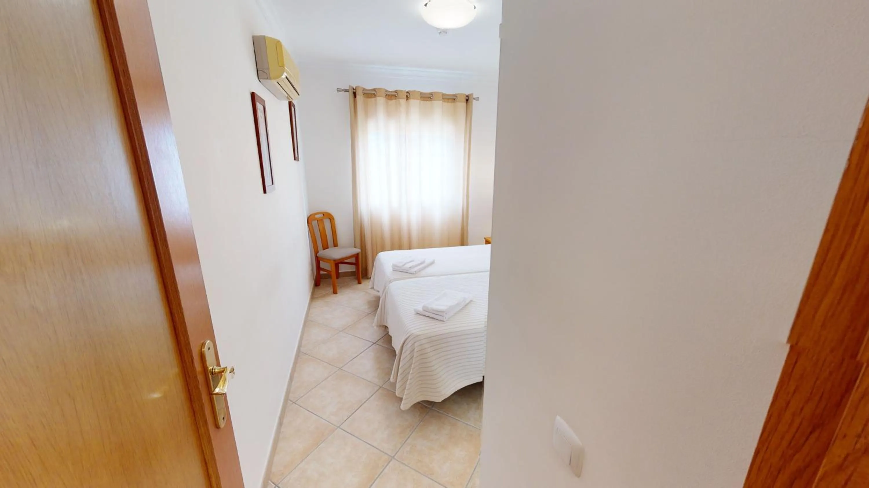 Bedroom, Bed in Praia da Lota Beachfront Resort - Hotel & Apartments